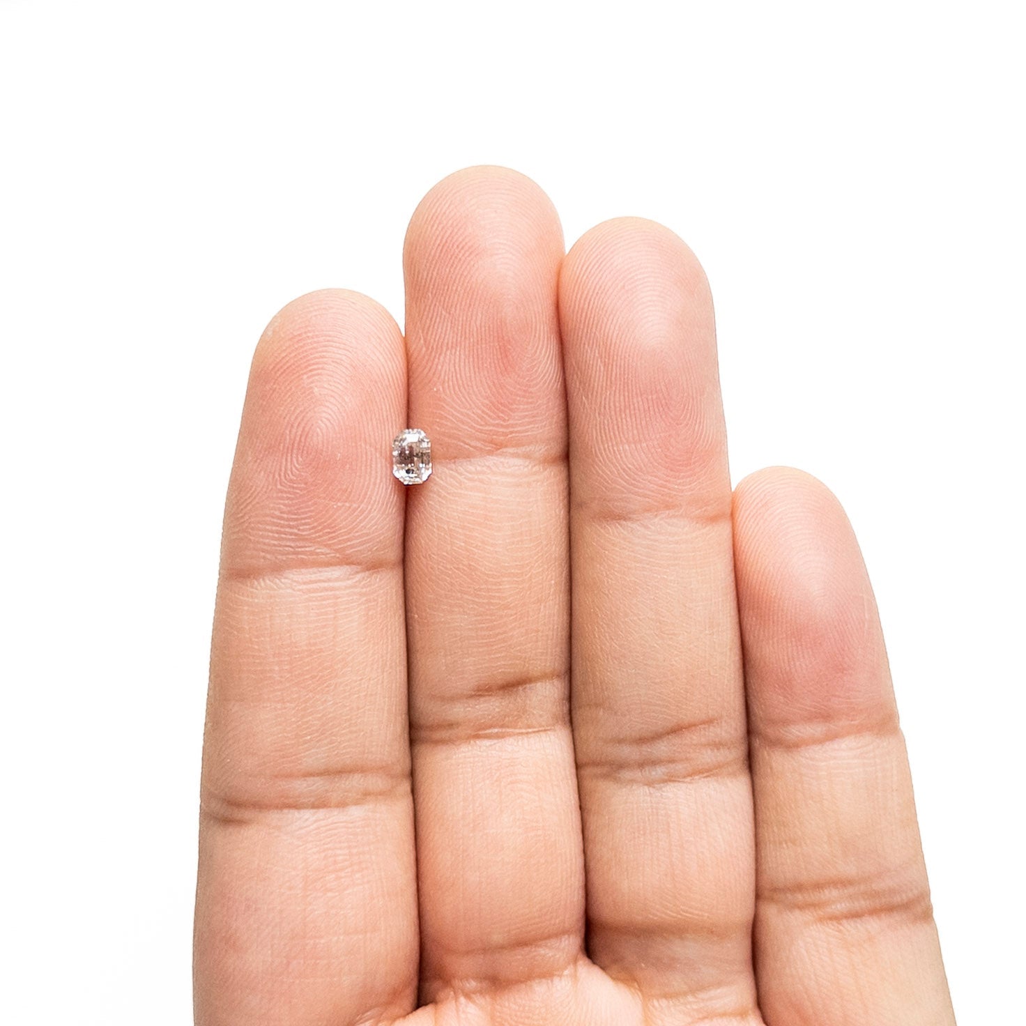 The 0.42ct 4.92x3.48x2.62mm Cut Corner Rectangle Step Cut 🇨🇦 27688-01 by East London jeweller Rachel Boston | Discover our collections of unique and timeless engagement rings, wedding rings, and modern fine jewellery.