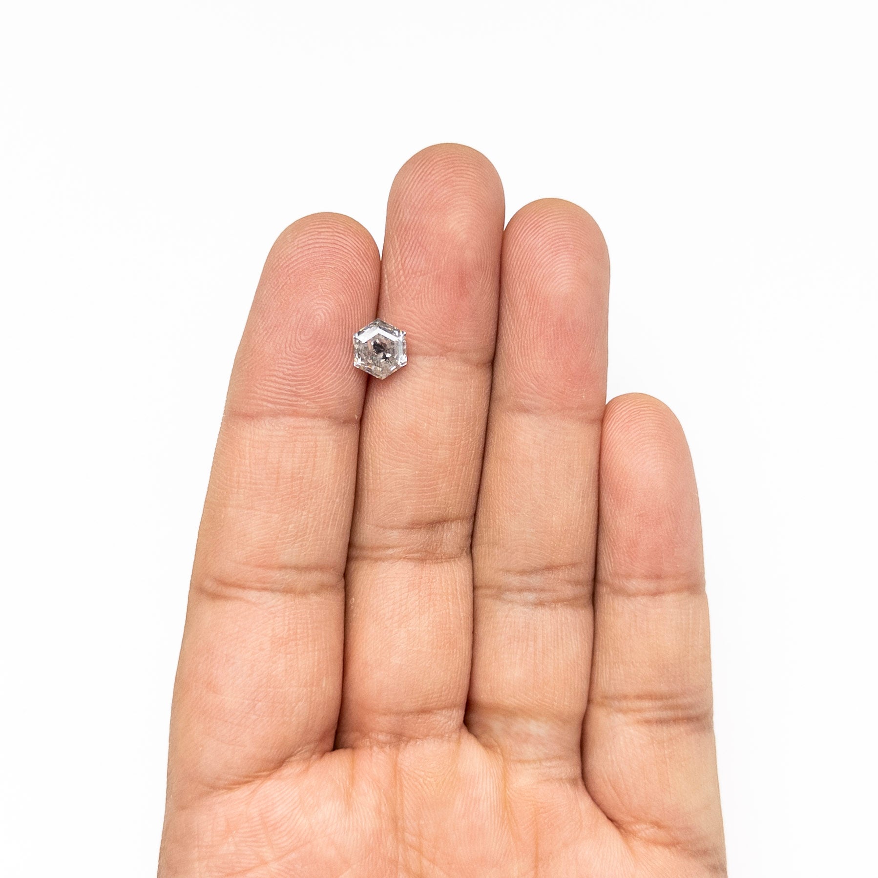 The 1.76ct 7.47x6.59x4.49mm Hexagon Step Cut 🇨🇦 27693-01 by East London jeweller Rachel Boston | Discover our collections of unique and timeless engagement rings, wedding rings, and modern fine jewellery.