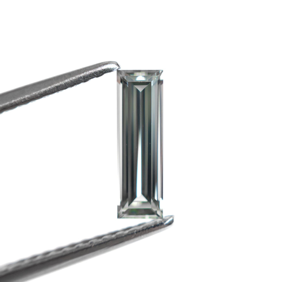 The 0.59ct 9.05x2.80x2.00mm Baguette Step Cut Sapphire 27720-03 by East London jeweller Rachel Boston | Discover our collections of unique and timeless engagement rings, wedding rings, and modern fine jewellery. - Rachel Boston Jewellery