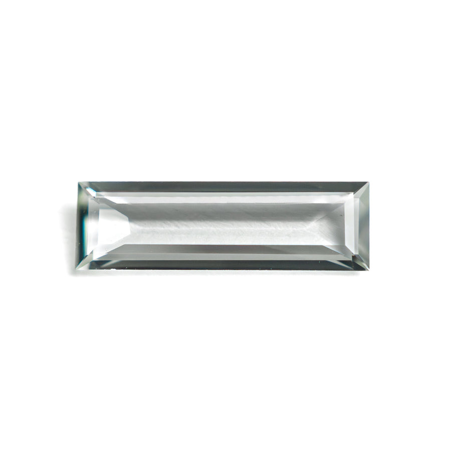 The 0.81ct 11.41x3.48x1.63mm Baguette Step Cut Sapphire 27720-05 by East London jeweller Rachel Boston | Discover our collections of unique and timeless engagement rings, wedding rings, and modern fine jewellery. - Rachel Boston Jewellery