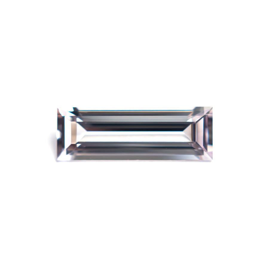 The 0.91ct 10.30x3.53x2.27mm Baguette Step Cut Sapphire 27720-06 by East London jeweller Rachel Boston | Discover our collections of unique and timeless engagement rings, wedding rings, and modern fine jewellery. - Rachel Boston Jewellery