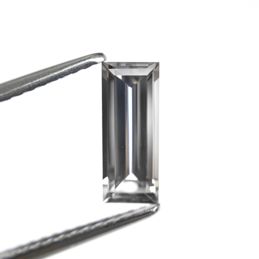 The 1.06ct 9.53x3.81x2.64mm Baguette Step Cut Sapphire 27720-07 by East London jeweller Rachel Boston | Discover our collections of unique and timeless engagement rings, wedding rings, and modern fine jewellery. - Rachel Boston Jewellery