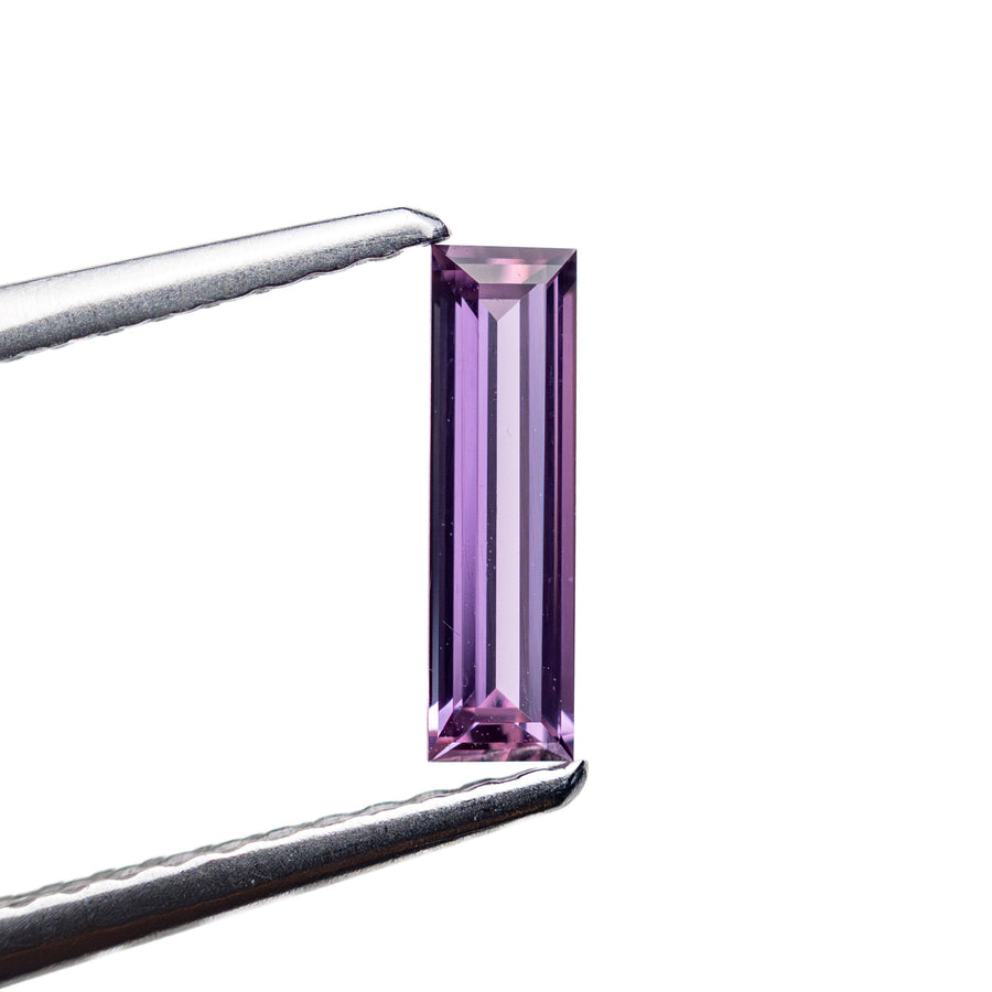 The 0.39ct 8.54x2.47x1.62mm Baguette Step Cut Sapphire 27721-05 by East London jeweller Rachel Boston | Discover our collections of unique and timeless engagement rings, wedding rings, and modern fine jewellery. - Rachel Boston Jewellery
