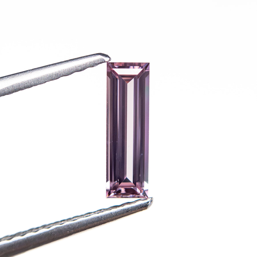 The 0.52ct 8.73x2.73x1.87mm Baguette Step Cut Sapphire 27721-06 by East London jeweller Rachel Boston | Discover our collections of unique and timeless engagement rings, wedding rings, and modern fine jewellery. - Rachel Boston Jewellery