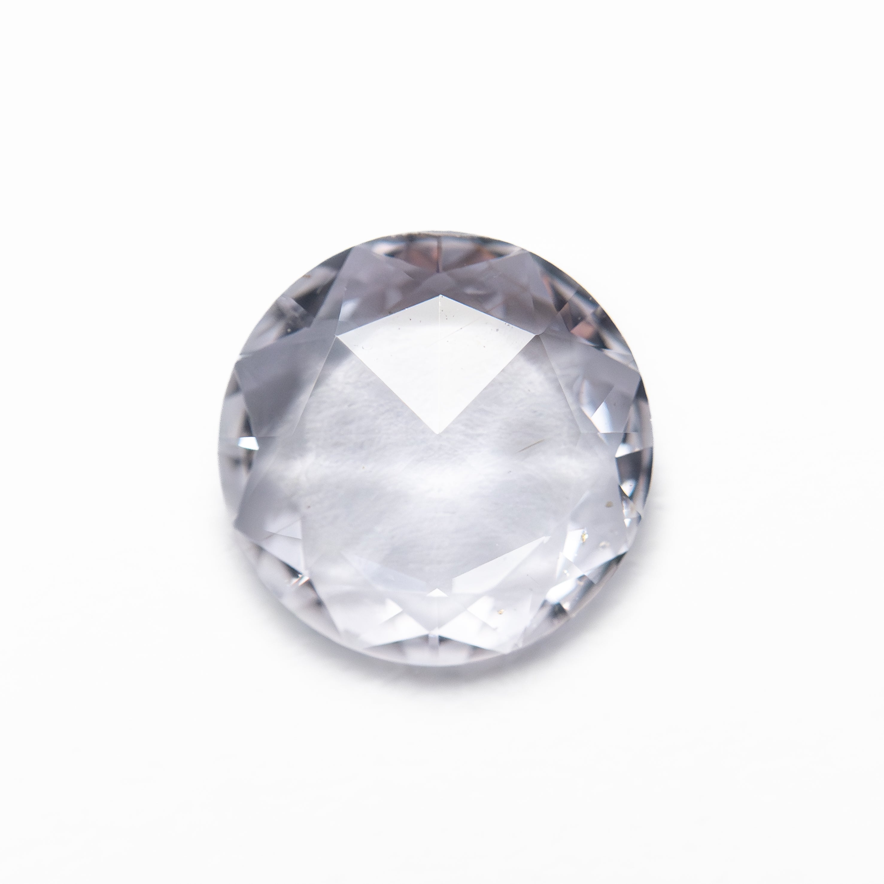 The 1.21ct 8.02x8.00x2.14mm Round Rosecut Sapphire 27743-01 by East London jeweller Rachel Boston | Discover our collections of unique and timeless engagement rings, wedding rings, and modern fine jewellery.