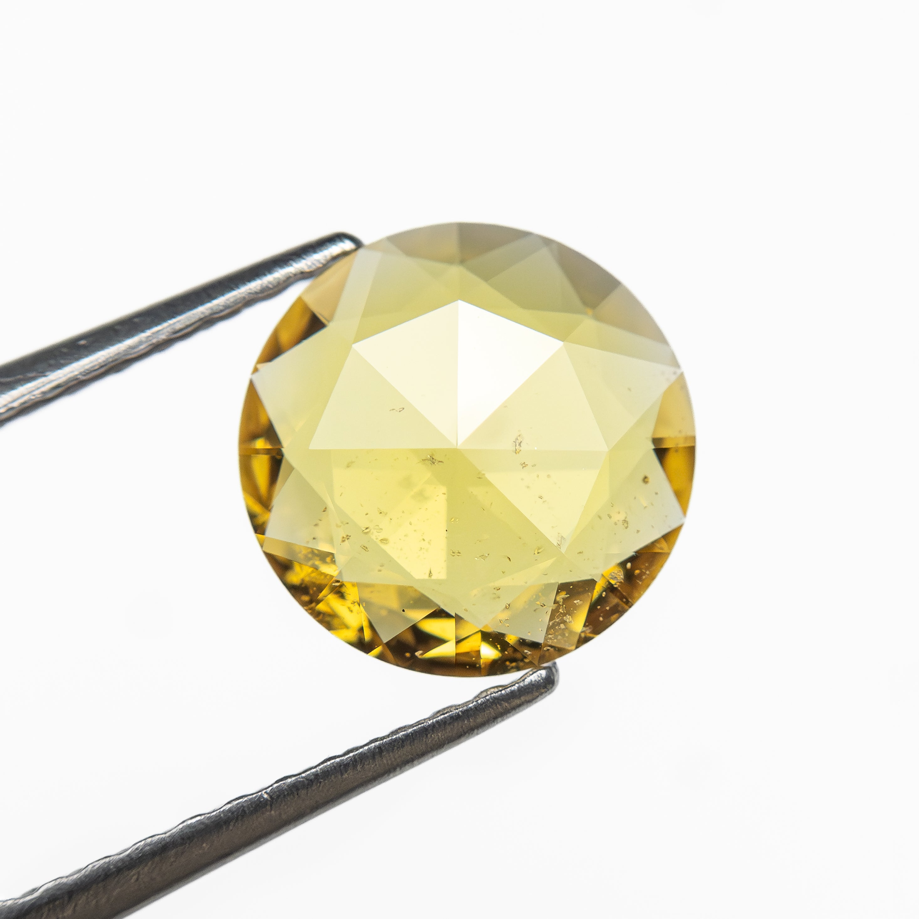 The 1.20ct 8.02x8.00x2.16mm Round Rosecut Sapphire 27743-02 by East London jeweller Rachel Boston | Discover our collections of unique and timeless engagement rings, wedding rings, and modern fine jewellery.