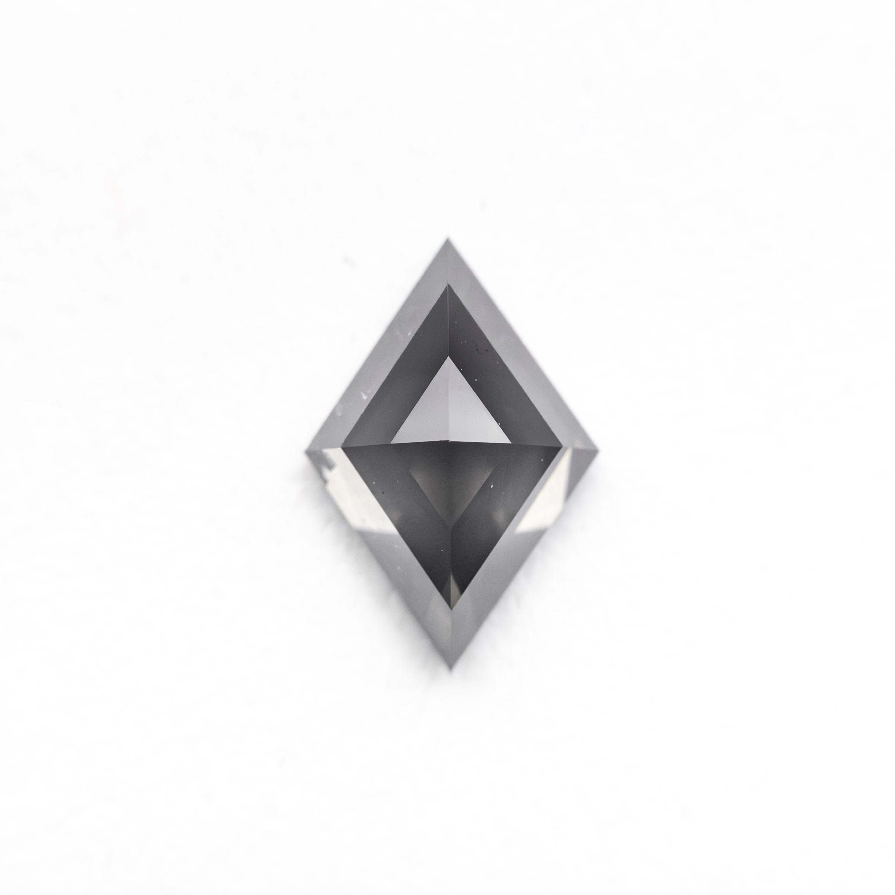 The 0.74ct 8.36x5.67x3.14mm Fancy Grey Lozenge Rosecut 27909-03 by East London jeweller Rachel Boston | Discover our collections of unique and timeless engagement rings, wedding rings, and modern fine jewellery.