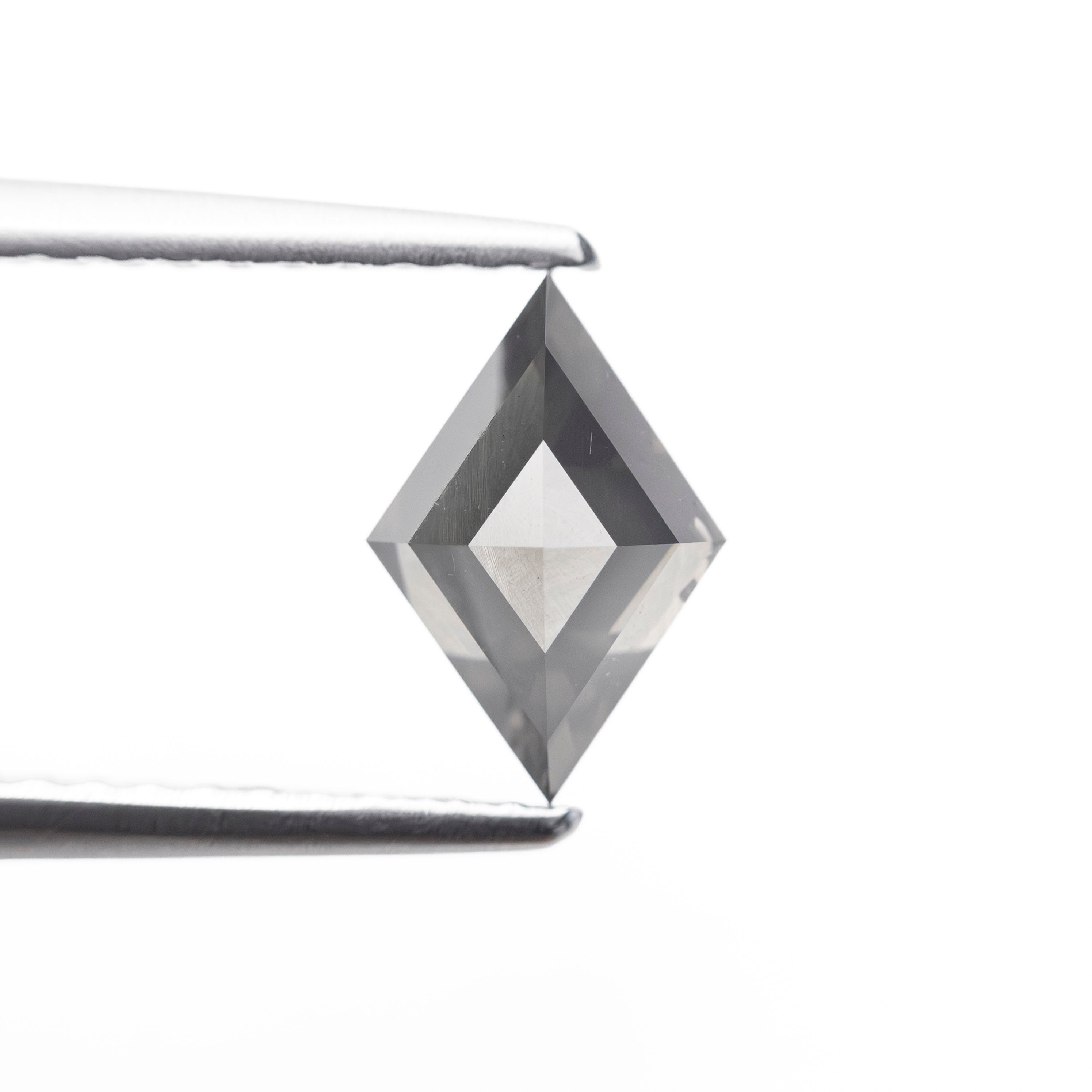 The 0.74ct 8.36x5.67x3.14mm Fancy Grey Lozenge Rosecut 27909-03 by East London jeweller Rachel Boston | Discover our collections of unique and timeless engagement rings, wedding rings, and modern fine jewellery.