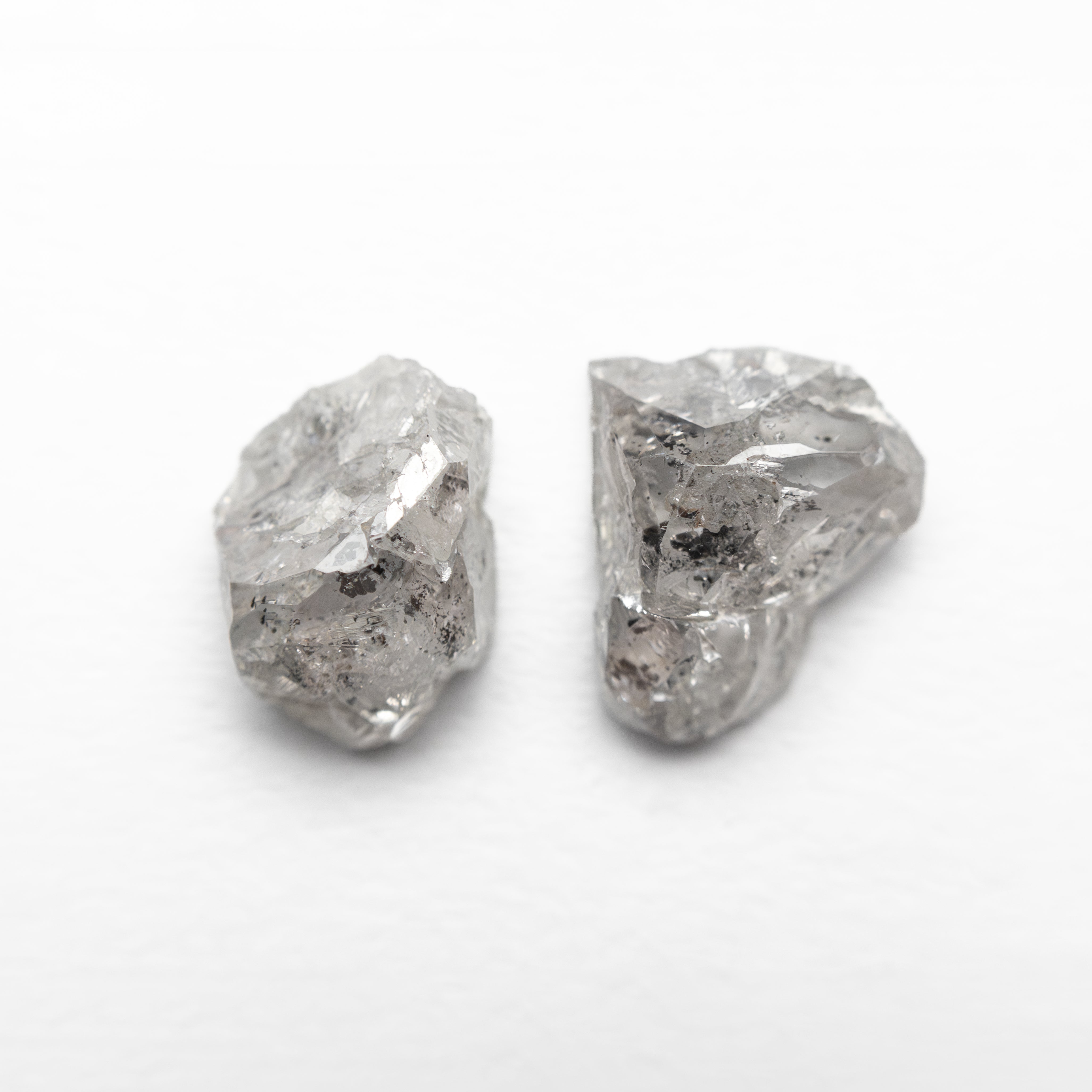 The 3.30cttw 2pc 8.32x6.09x4.01mm 8.63x7.03x3.74mm Polished Raw Diamond Matching Pair 🇨🇦 27968-01 by East London jeweller Rachel Boston | Discover our collections of unique and timeless engagement rings, wedding rings, and modern fine jewellery.
