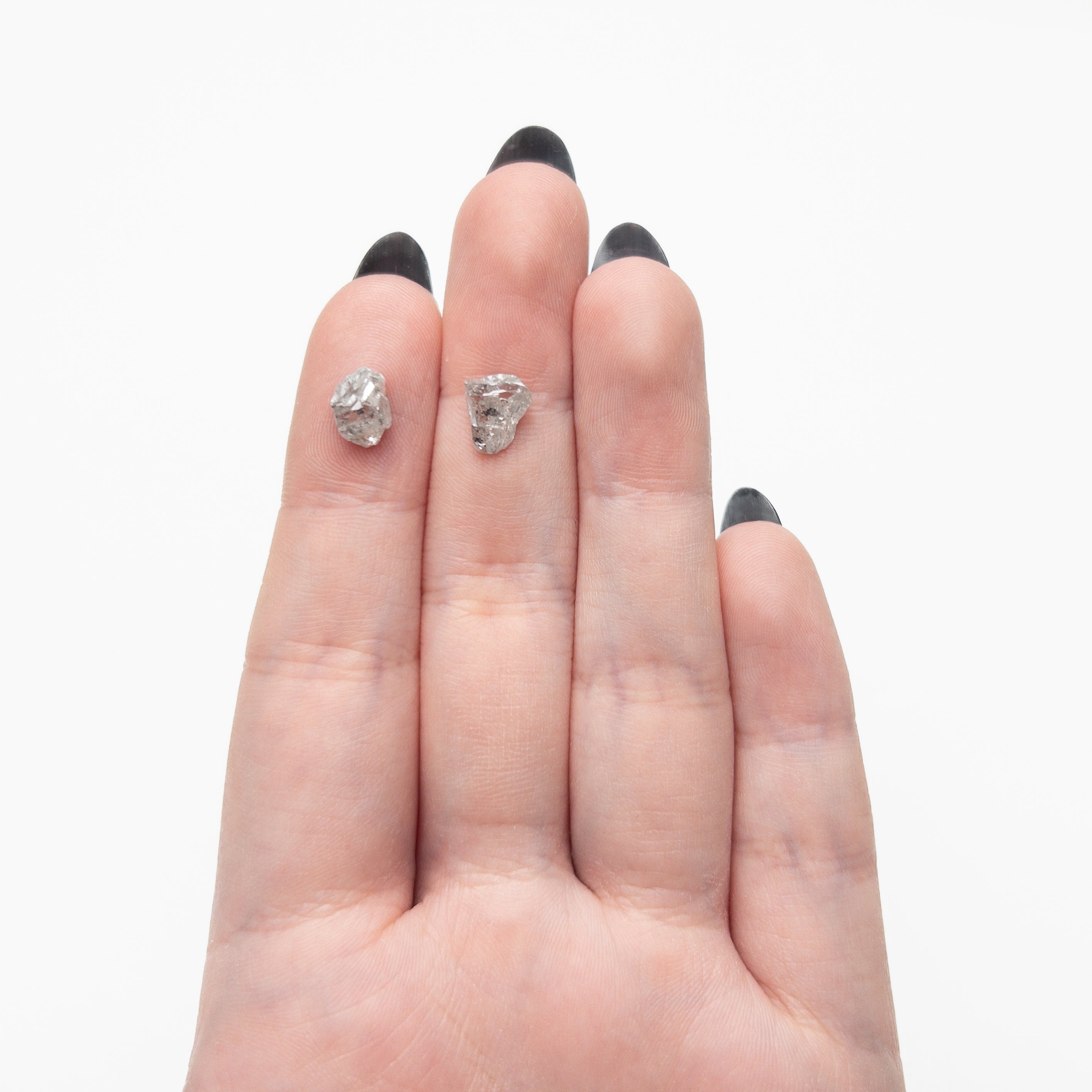 The 3.30cttw 2pc 8.32x6.09x4.01mm 8.63x7.03x3.74mm Polished Raw Diamond Matching Pair 🇨🇦 27968-01 by East London jeweller Rachel Boston | Discover our collections of unique and timeless engagement rings, wedding rings, and modern fine jewellery.
