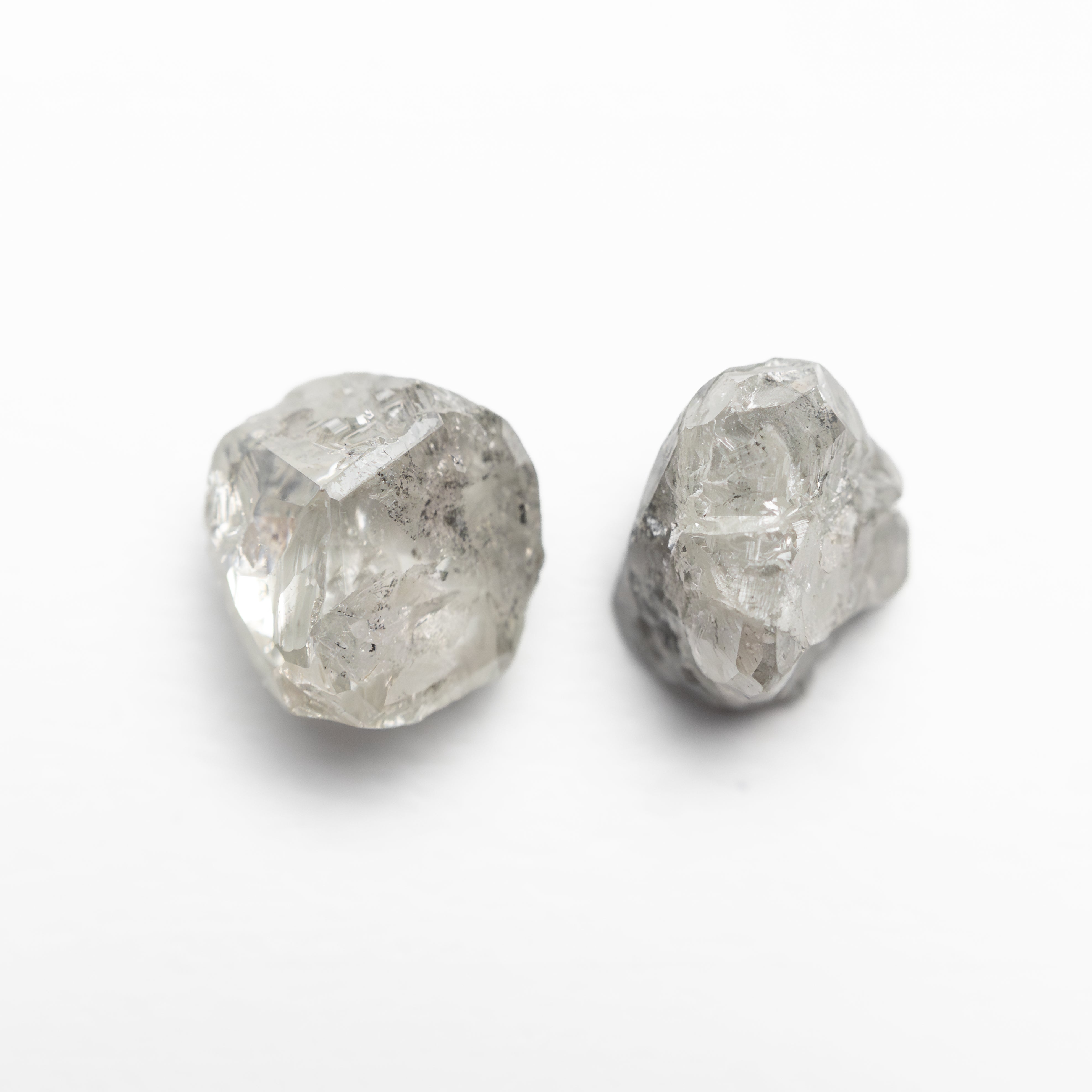 The 3.78cttw 2pc 7.28x6.85x4.57mm 6.55x6.32x5.44mm Polished Raw Diamond Matching Pair 🇨🇦 27971-01 by East London jeweller Rachel Boston | Discover our collections of unique and timeless engagement rings, wedding rings, and modern fine jewellery.