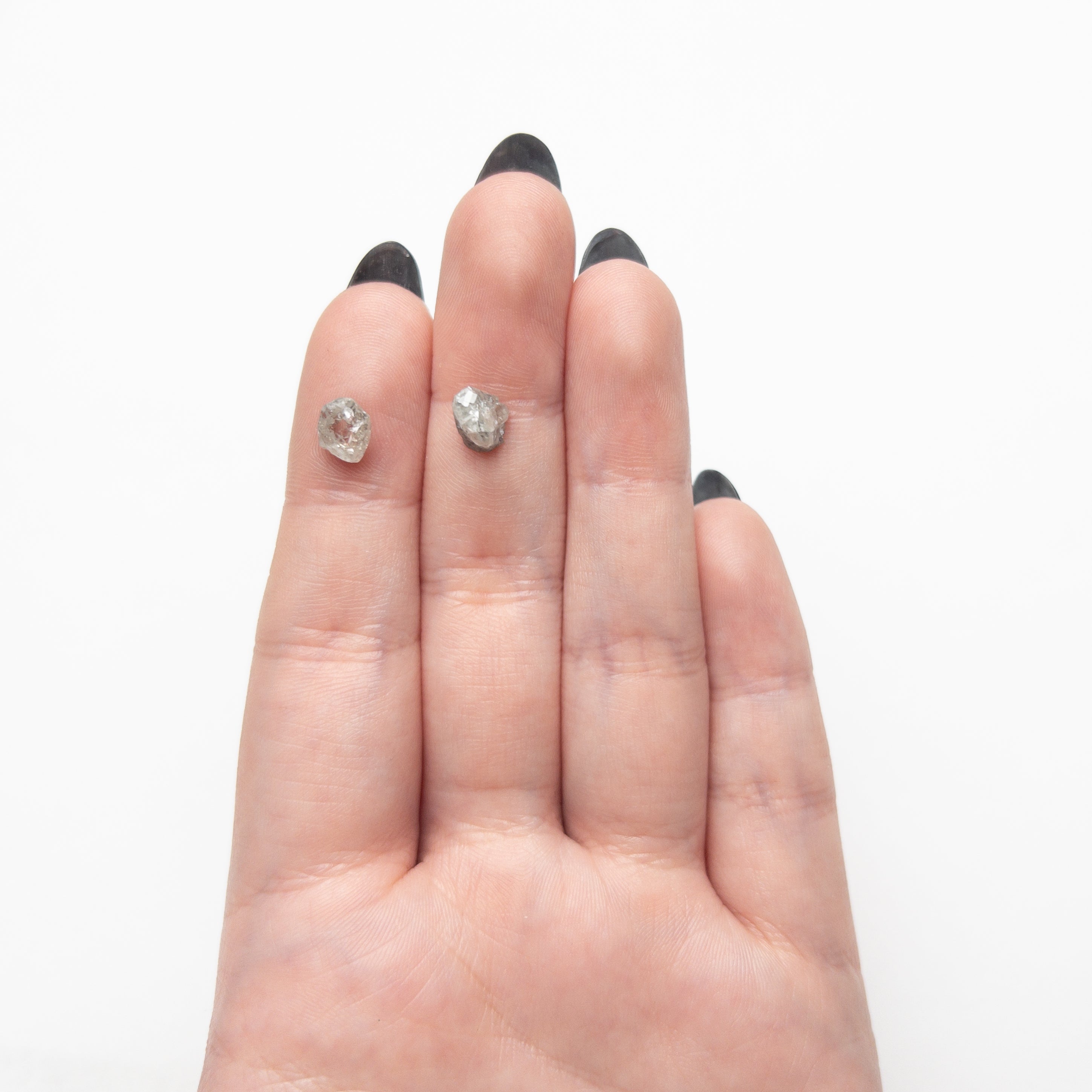 The 3.78cttw 2pc 7.28x6.85x4.57mm 6.55x6.32x5.44mm Polished Raw Diamond Matching Pair 🇨🇦 27971-01 by East London jeweller Rachel Boston | Discover our collections of unique and timeless engagement rings, wedding rings, and modern fine jewellery.