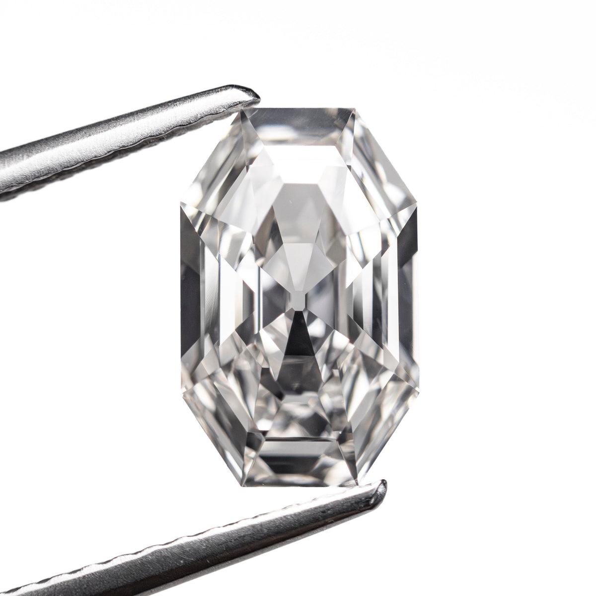 The 1.80ct 10.43x6.50x3.53mm GIA VVS1 H Cut Corner Rectangle Step Cut 28011-01 by East London jeweller Rachel Boston | Discover our collections of unique and timeless engagement rings, wedding rings, and modern fine jewellery.