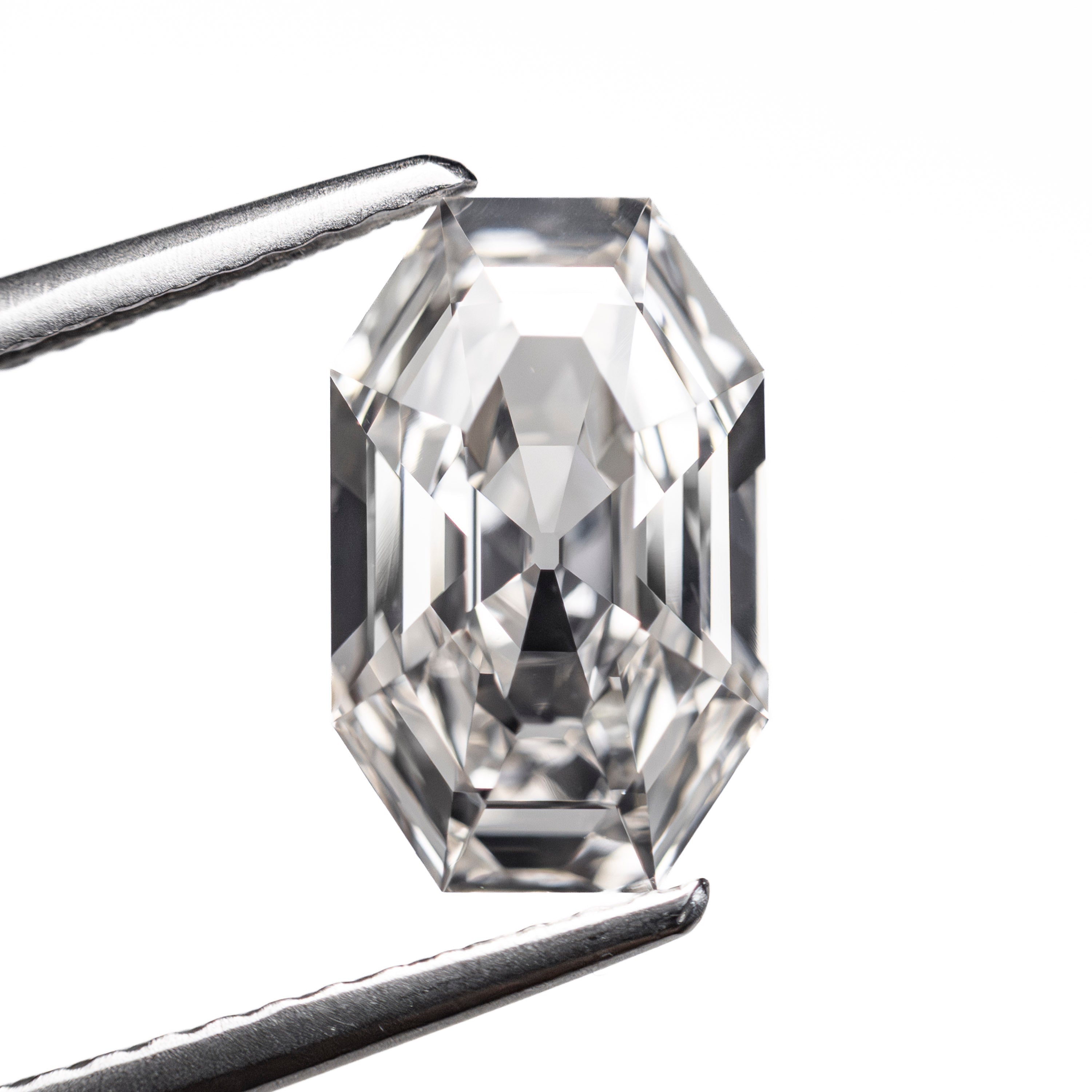 The 1.80ct 10.43x6.50x3.53mm GIA VVS1 H Cut Corner Rectangle Step Cut 28011-01 by East London jeweller Rachel Boston | Discover our collections of unique and timeless engagement rings, wedding rings, and modern fine jewellery.