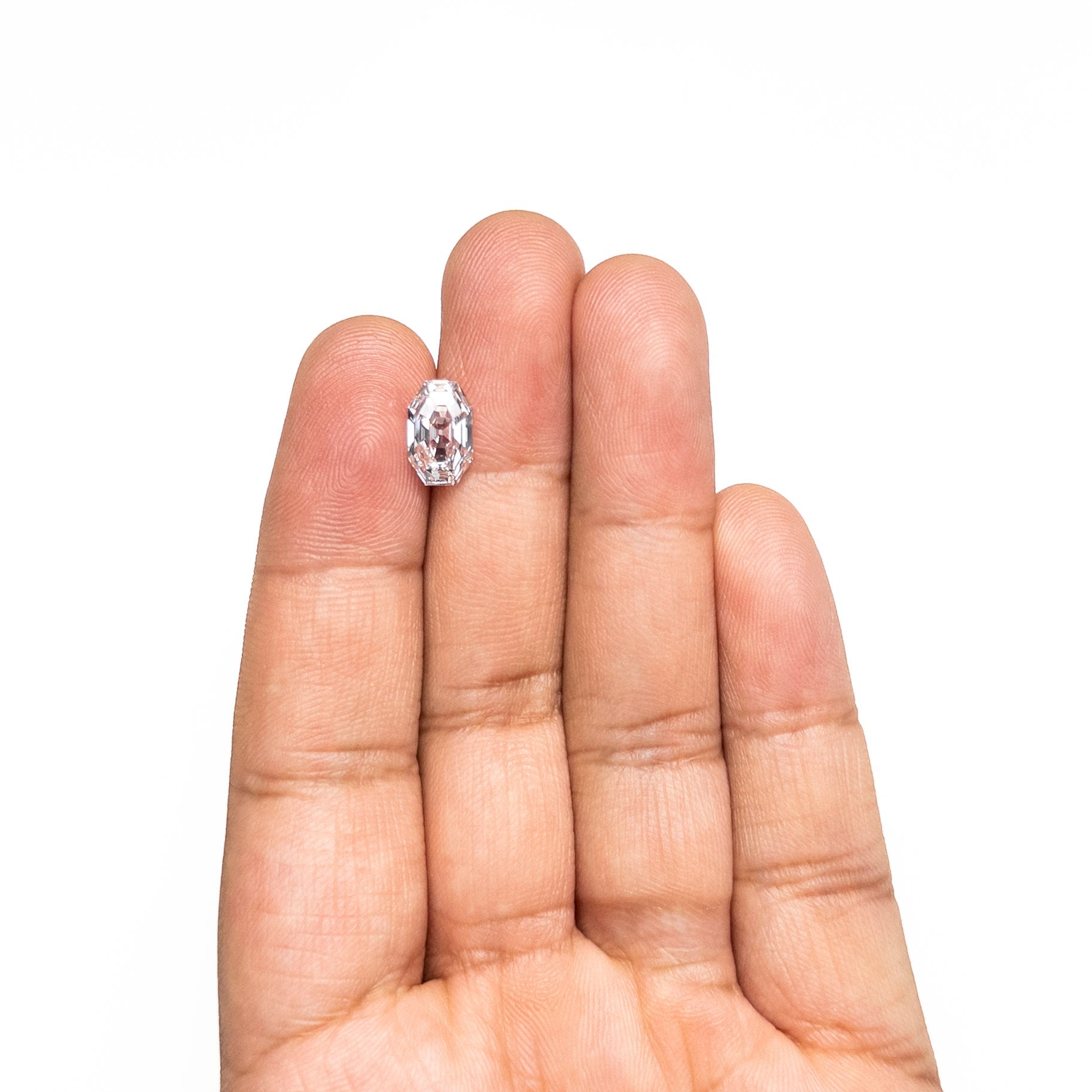 The 1.80ct 10.43x6.50x3.53mm GIA VVS1 H Cut Corner Rectangle Step Cut 28011-01 by East London jeweller Rachel Boston | Discover our collections of unique and timeless engagement rings, wedding rings, and modern fine jewellery.