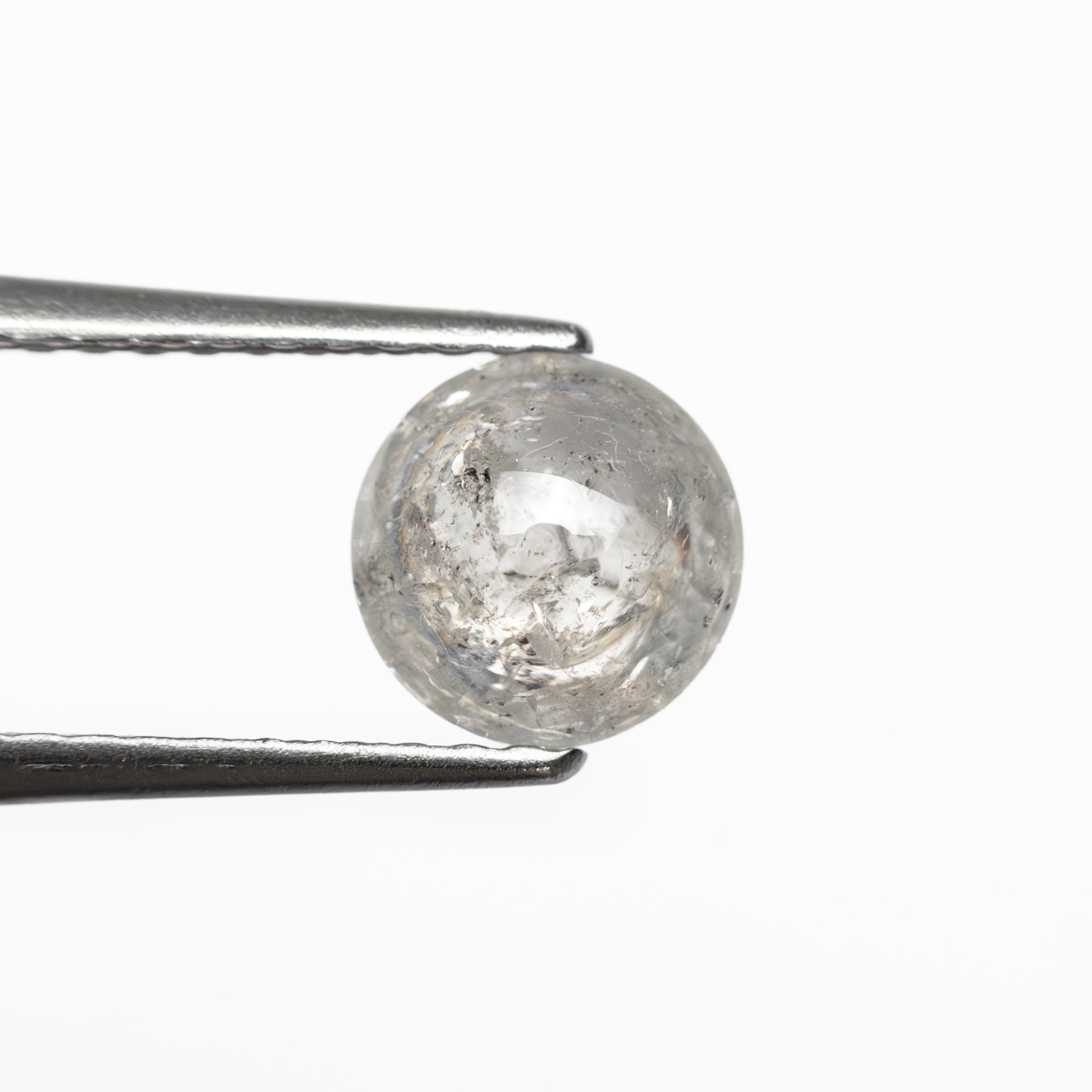 The 0.86ct 6.05x6.00x2.91mm Round Cabochon 🇿🇦 28042-12 by East London jeweller Rachel Boston | Discover our collections of unique and timeless engagement rings, wedding rings, and modern fine jewellery.