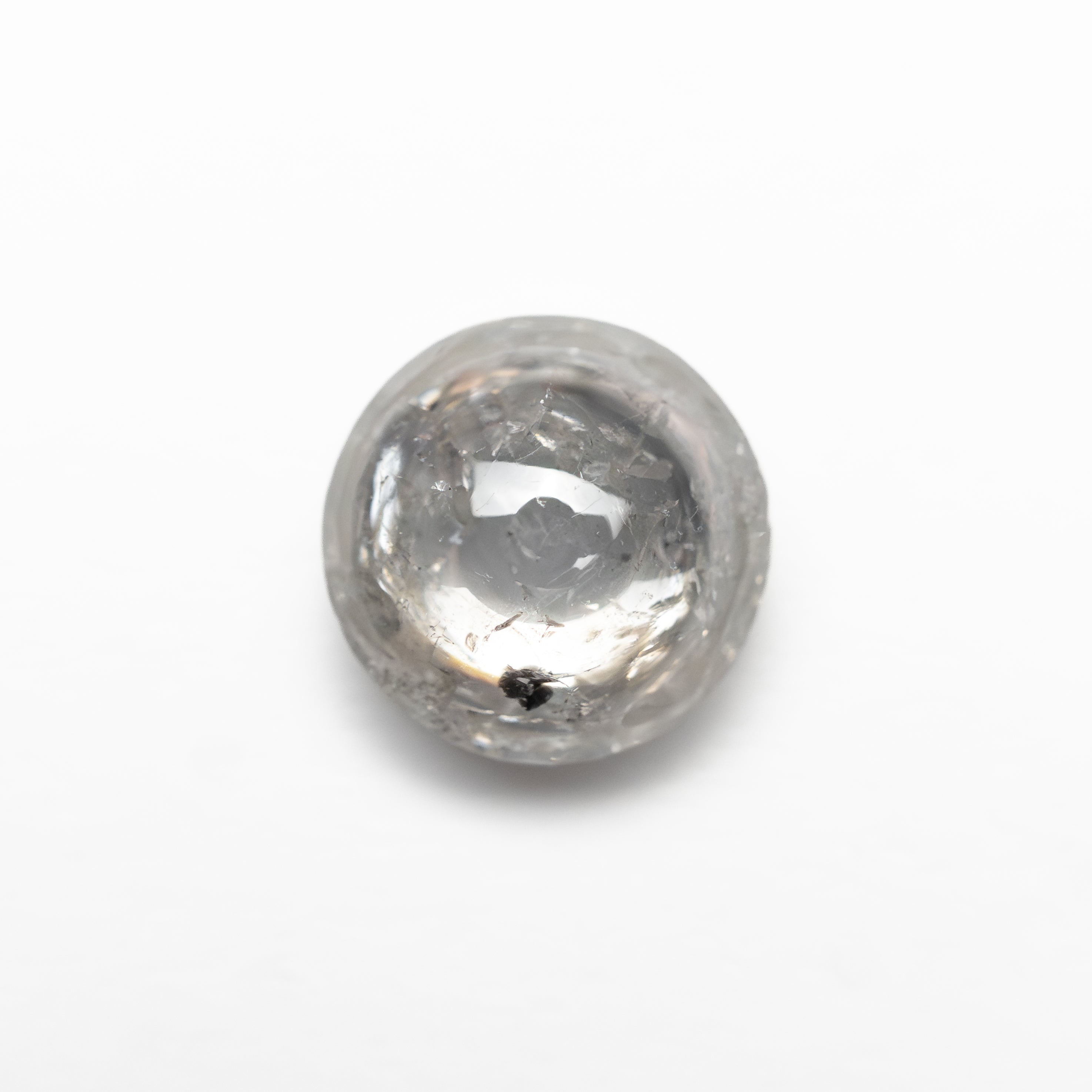The 1.46ct 6.74x6.70x3.60mm Round Cabochon 🇿🇦 28042-13 by East London jeweller Rachel Boston | Discover our collections of unique and timeless engagement rings, wedding rings, and modern fine jewellery.