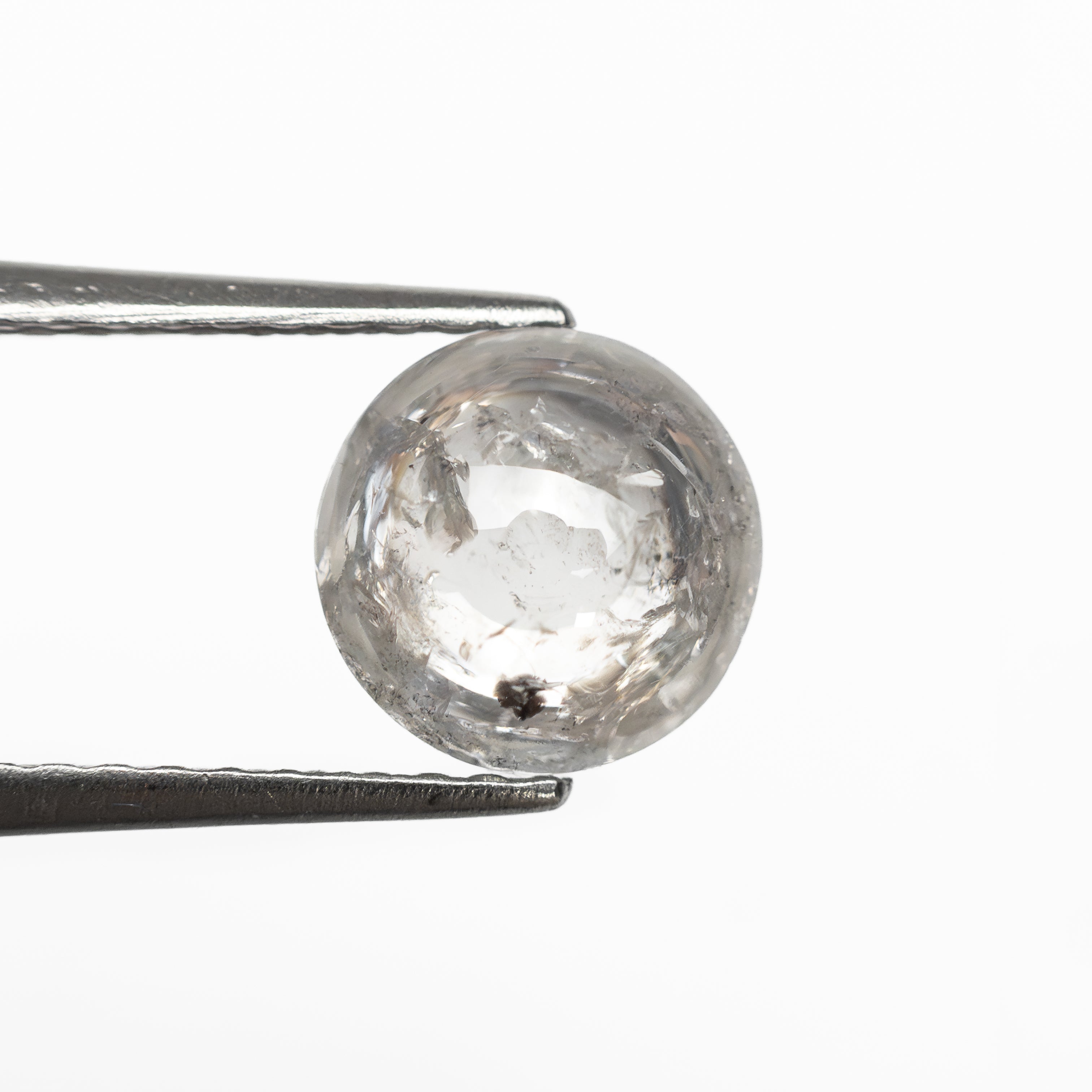 The 1.46ct 6.74x6.70x3.60mm Round Cabochon 🇿🇦 28042-13 by East London jeweller Rachel Boston | Discover our collections of unique and timeless engagement rings, wedding rings, and modern fine jewellery.