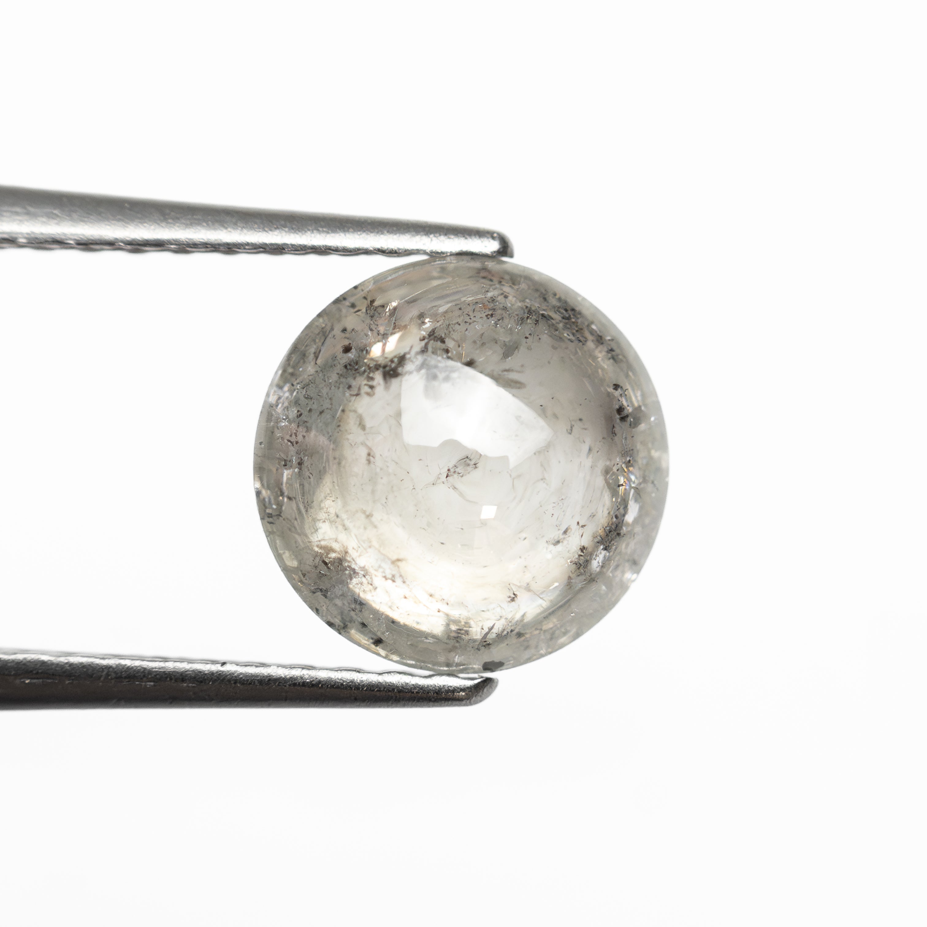 The 1.81ct 7.44x7.42x3.99mm Round Cabochon 🇿🇦 28042-15 by East London jeweller Rachel Boston | Discover our collections of unique and timeless engagement rings, wedding rings, and modern fine jewellery.