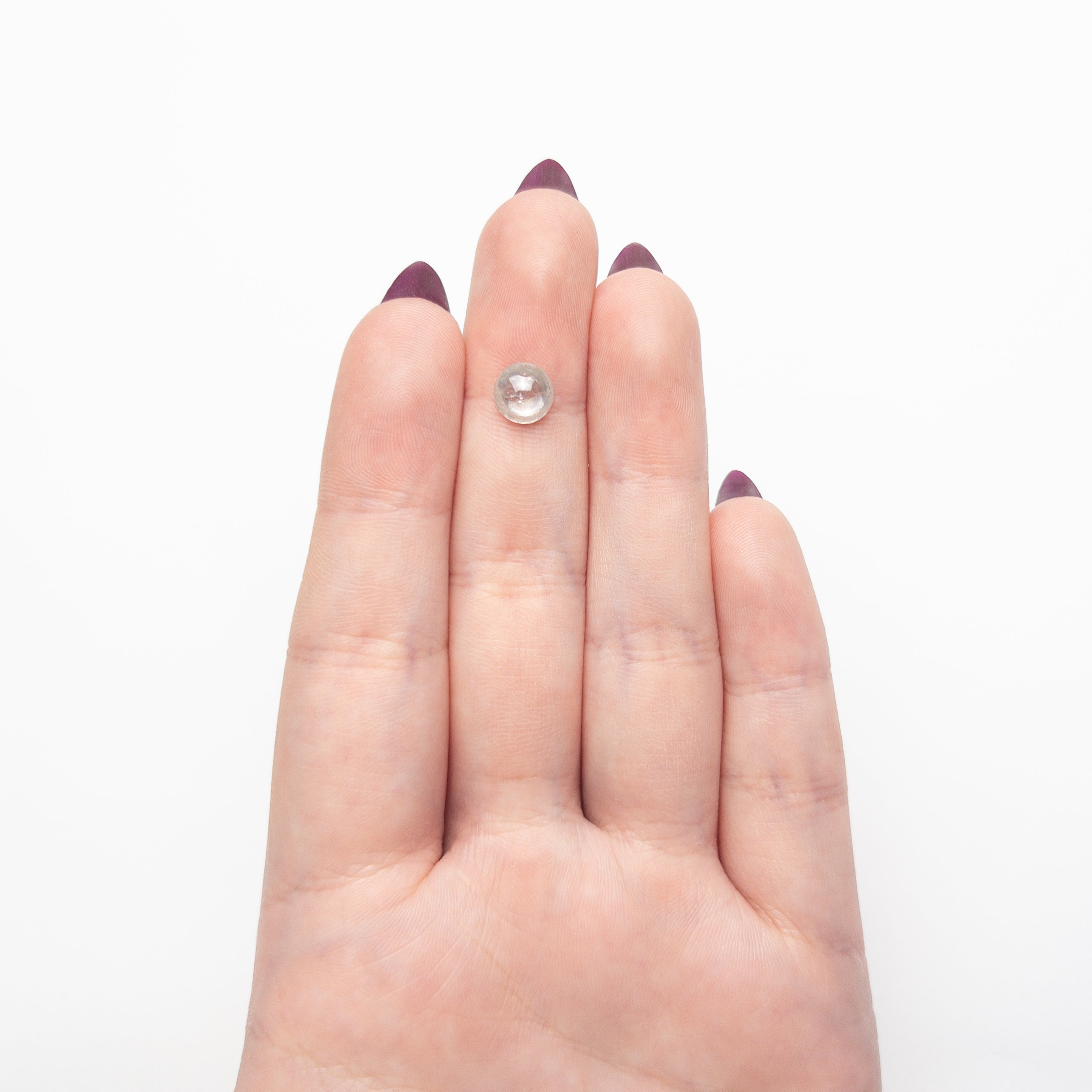 The 1.45ct 7.14x7.12x3.52mm Round Cabochon 🇿🇦 28042-18 by East London jeweller Rachel Boston | Discover our collections of unique and timeless engagement rings, wedding rings, and modern fine jewellery.