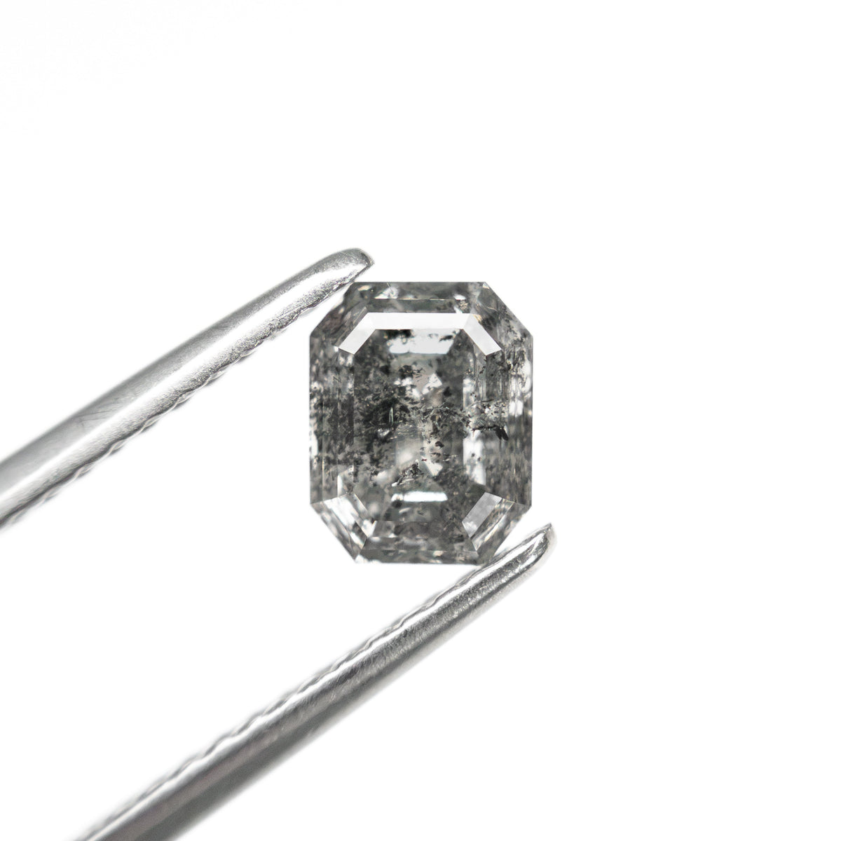 The 0.97ct 5.99x4.73x3.50mm Cut Corner Rectangle Step Cut 🇨🇦 28070-01 by East London jeweller Rachel Boston | Discover our collections of unique and timeless engagement rings, wedding rings, and modern fine jewellery.