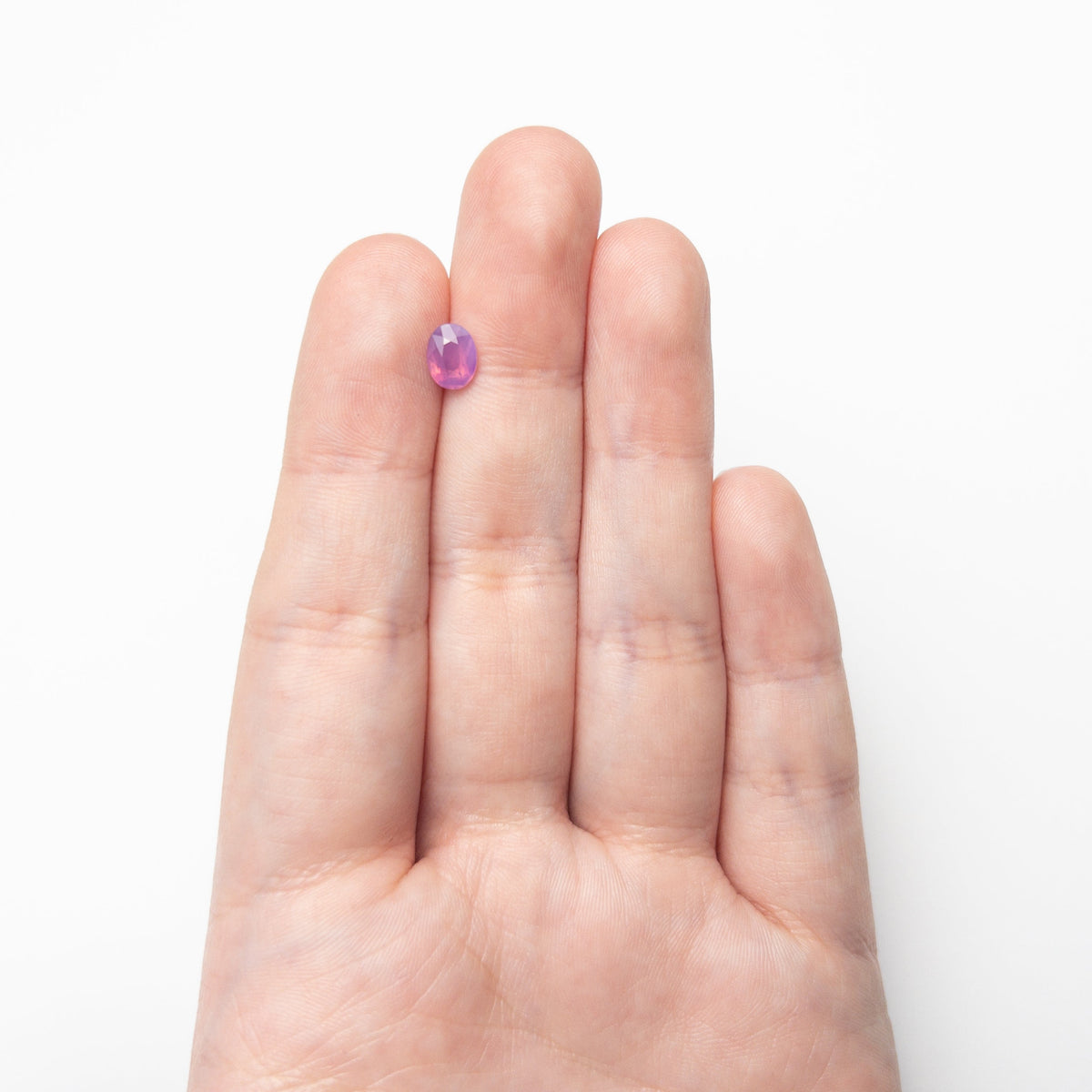 The 1.03ct 6.78x5.22x3.35mm Oval Brilliant Sapphire 28248-01 by East London jeweller Rachel Boston | Discover our collections of unique and timeless engagement rings, wedding rings, and modern fine jewellery.