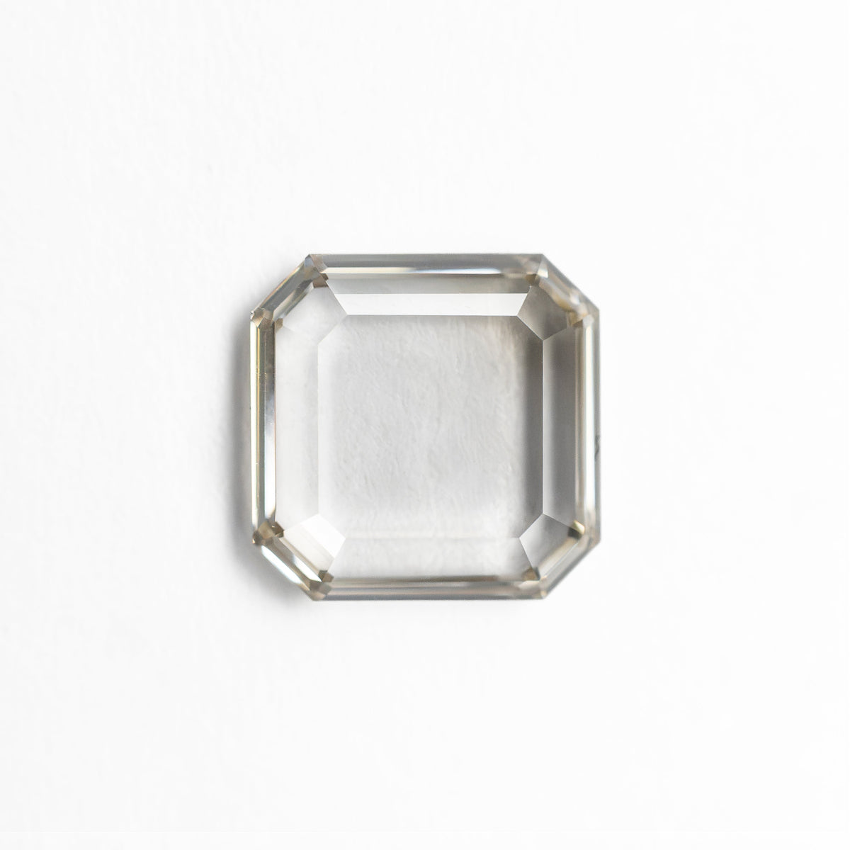 The 1.02ct 6.62x6.57x1.73mm VS1 Q-R Cut Corner Square Portrait Cut 28326-01 by East London jeweller Rachel Boston | Discover our collections of unique and timeless engagement rings, wedding rings, and modern fine jewellery.