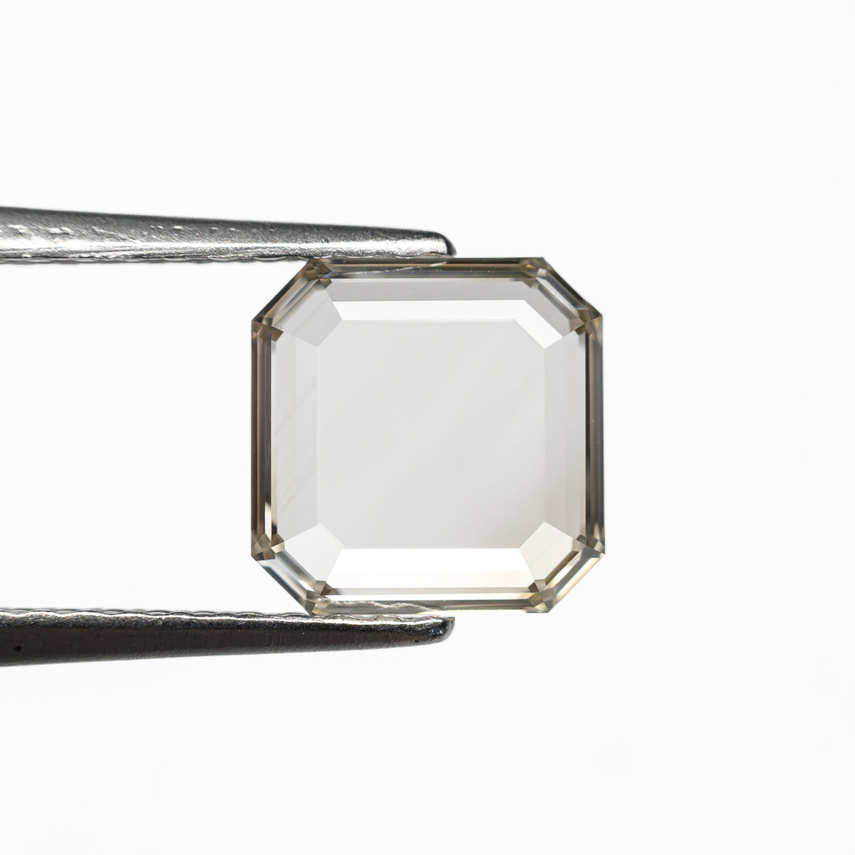 The 1.02ct 6.62x6.57x1.73mm VS1 Q-R Cut Corner Square Portrait Cut 28326-01 by East London jeweller Rachel Boston | Discover our collections of unique and timeless engagement rings, wedding rings, and modern fine jewellery.