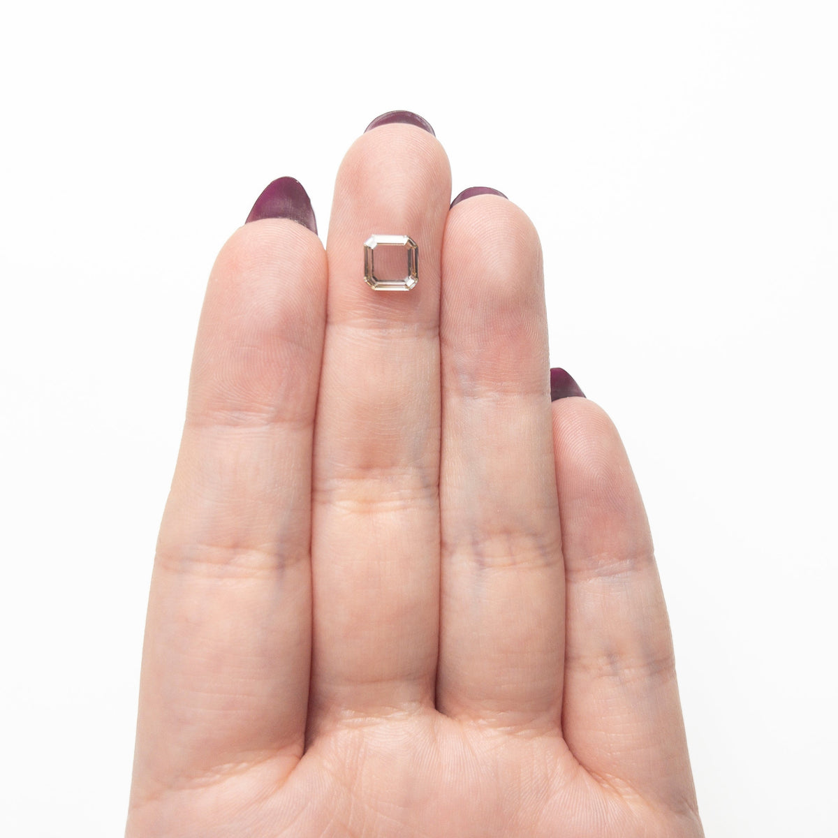 The 1.02ct 6.62x6.57x1.73mm VS1 Q-R Cut Corner Square Portrait Cut 28326-01 by East London jeweller Rachel Boston | Discover our collections of unique and timeless engagement rings, wedding rings, and modern fine jewellery.