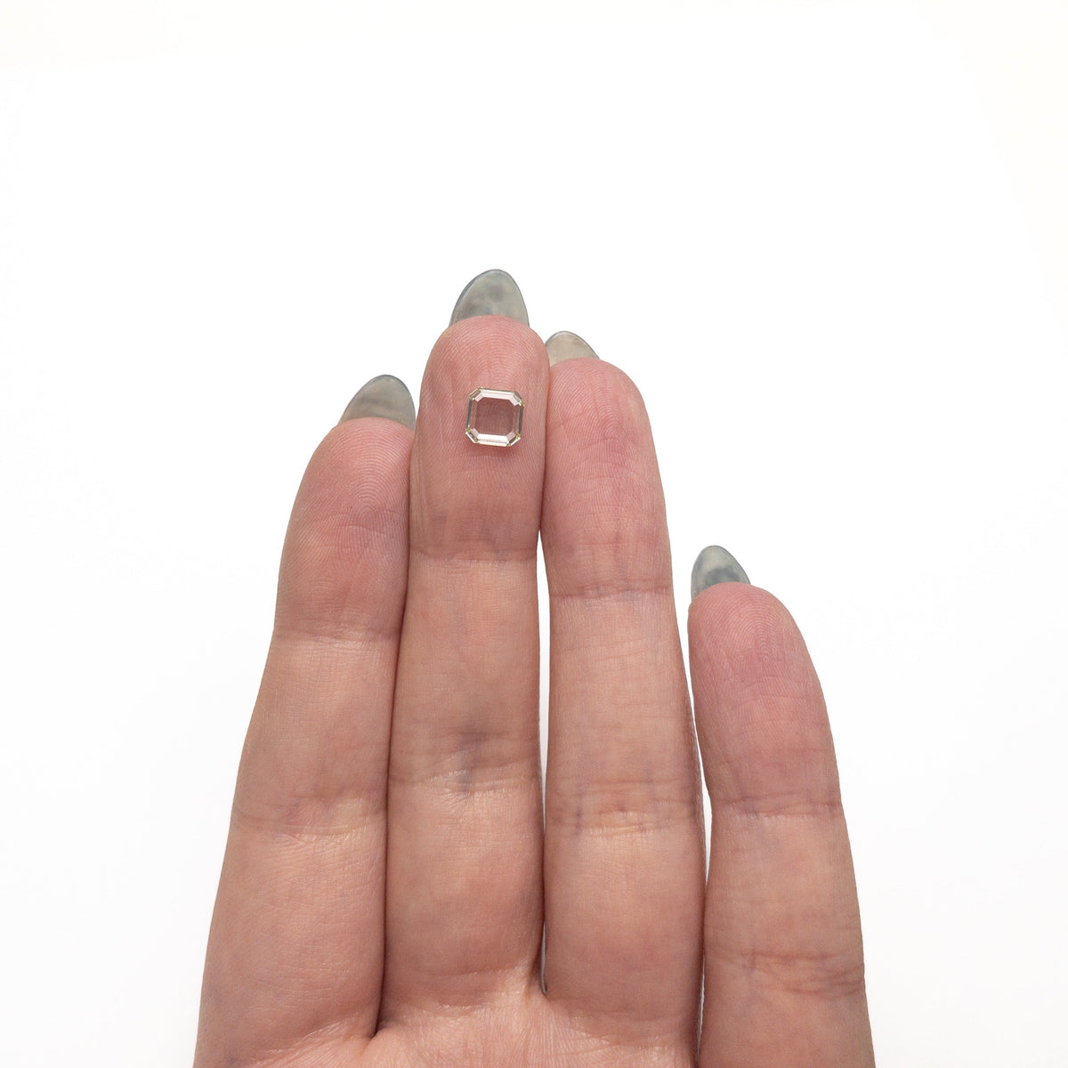 The 0.81ct 6.02x6.02x1.71mm SI2 O-P Cut Corner Rectangle Portrait Cut 28327-01 by East London jeweller Rachel Boston | Discover our collections of unique and timeless engagement rings, wedding rings, and modern fine jewellery.