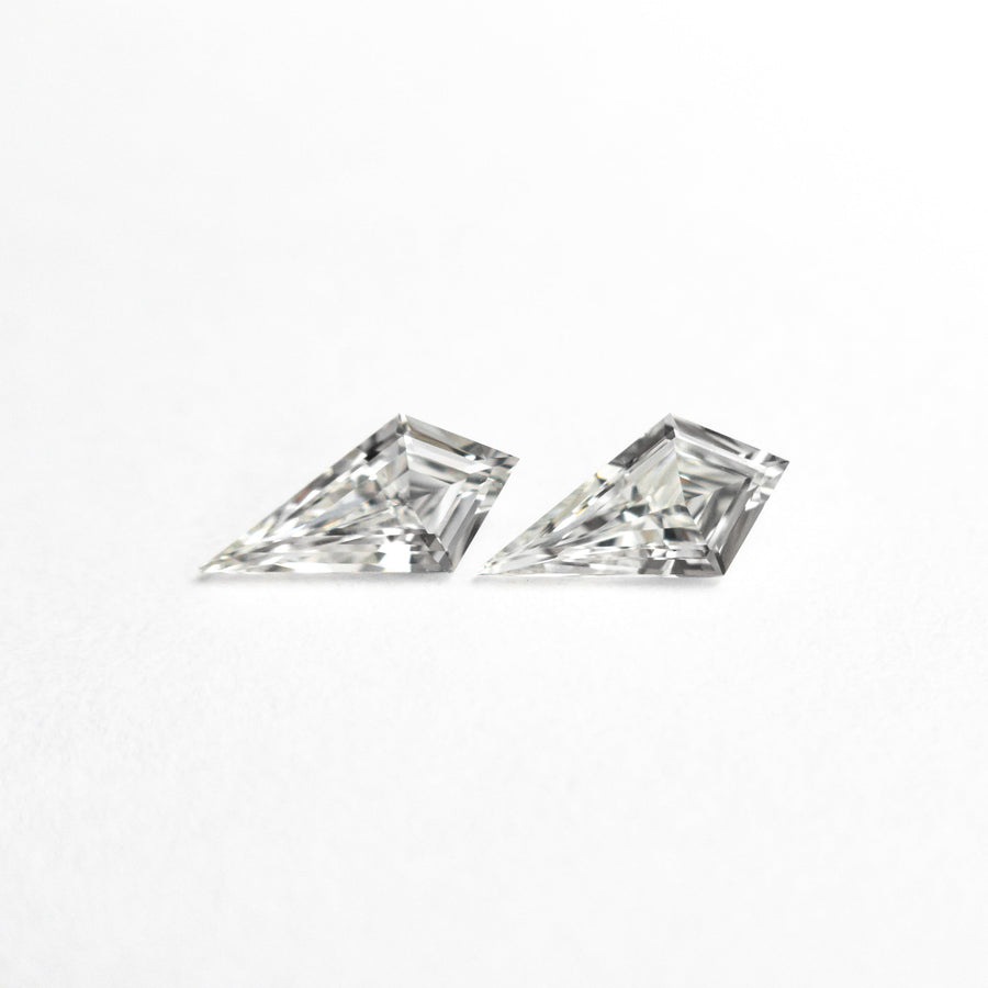 The 0.25cttw 2pc 5.92x2.93x1.52mm 5.92x3.02x1.42mm G VVS/VS Kite Step Cut Matching Pair 26308-01 by East London jeweller Rachel Boston | Discover our collections of unique and timeless engagement rings, wedding rings, and modern fine jewellery. - Rachel Boston Jewellery