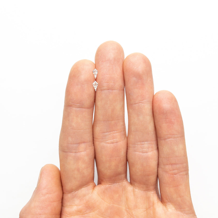 The 0.25cttw 2pc 5.92x2.93x1.52mm 5.92x3.02x1.42mm G VVS/VS Kite Step Cut Matching Pair 26308-01 by East London jeweller Rachel Boston | Discover our collections of unique and timeless engagement rings, wedding rings, and modern fine jewellery. - Rachel Boston Jewellery