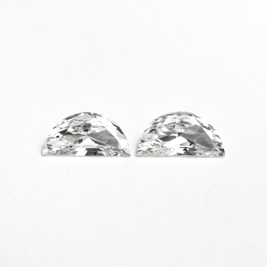 The 0.32cttw 2pc 5.80x2.93x1.37mm 5.95x3.02x1.48mm D-E VVS Half Moon Brilliant Matching Pair 26309-01 by East London jeweller Rachel Boston | Discover our collections of unique and timeless engagement rings, wedding rings, and modern fine jewellery. - Rachel Boston Jewellery