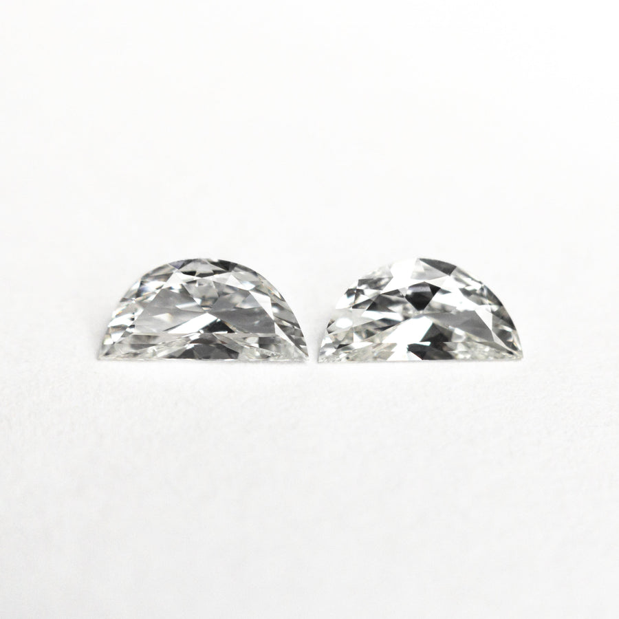 The 0.37cttw 2pc 6.06x2.98x1.60mm 6.02x2.98x1.50mm F-G VVS Half Moon Brilliant Matching Pair 26310-01 by East London jeweller Rachel Boston | Discover our collections of unique and timeless engagement rings, wedding rings, and modern fine jewellery. - Rachel Boston Jewellery