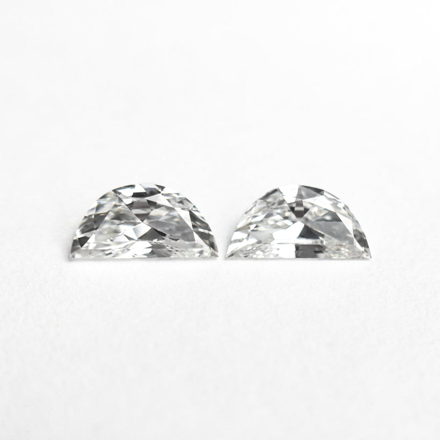 The 0.43cttw 2pc 5.98x3.00x1.79mm 6.02x3.00x1.58mm E VVS Half Moon Brilliant Matching Pair 26312-01 by East London jeweller Rachel Boston | Discover our collections of unique and timeless engagement rings, wedding rings, and modern fine jewellery. - Rachel Boston Jewellery