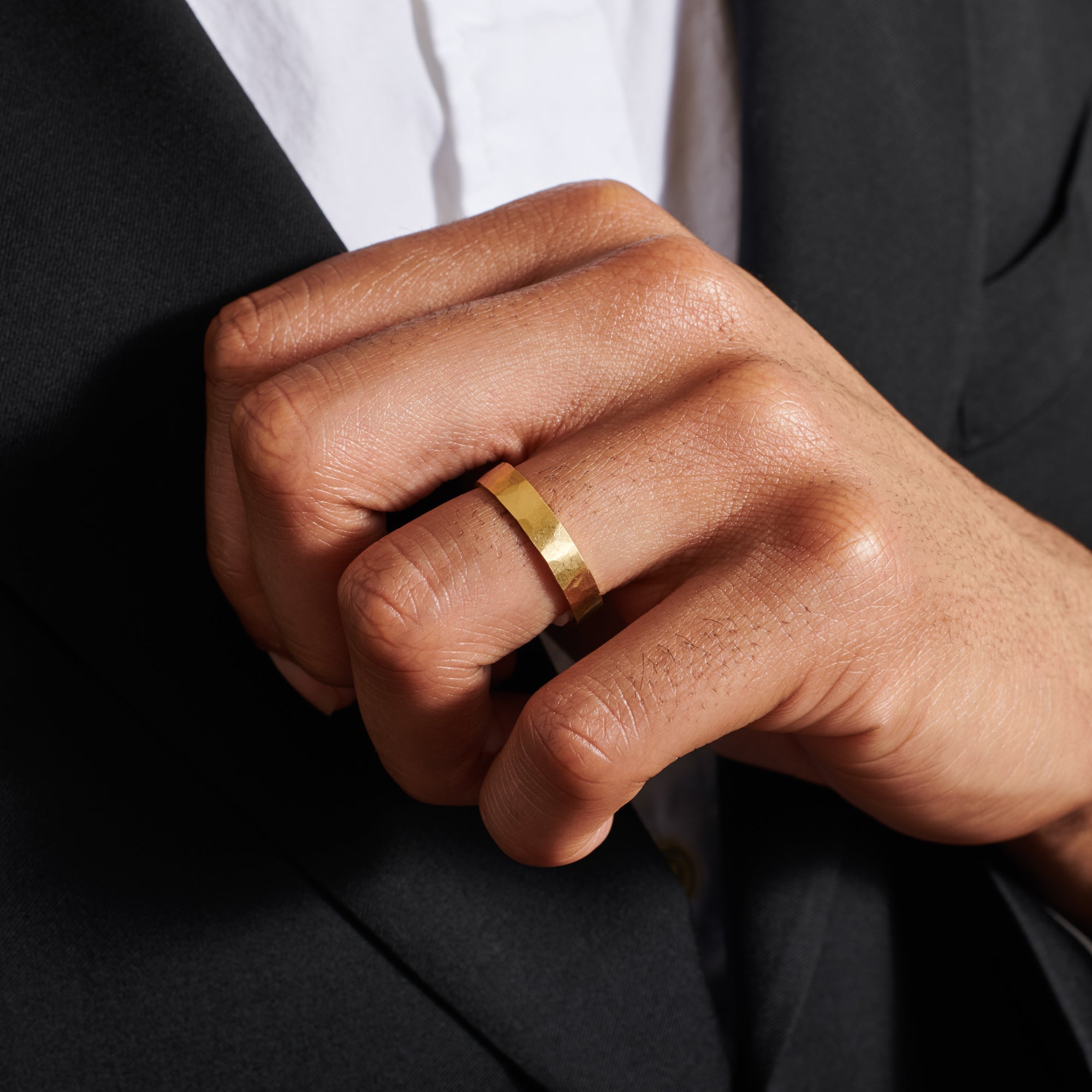 The Matte Hammered Flat Wedding Band - 4.5mm by East London jeweller Rachel Boston | Discover our collections of unique and timeless engagement rings, wedding rings, and modern fine jewellery.