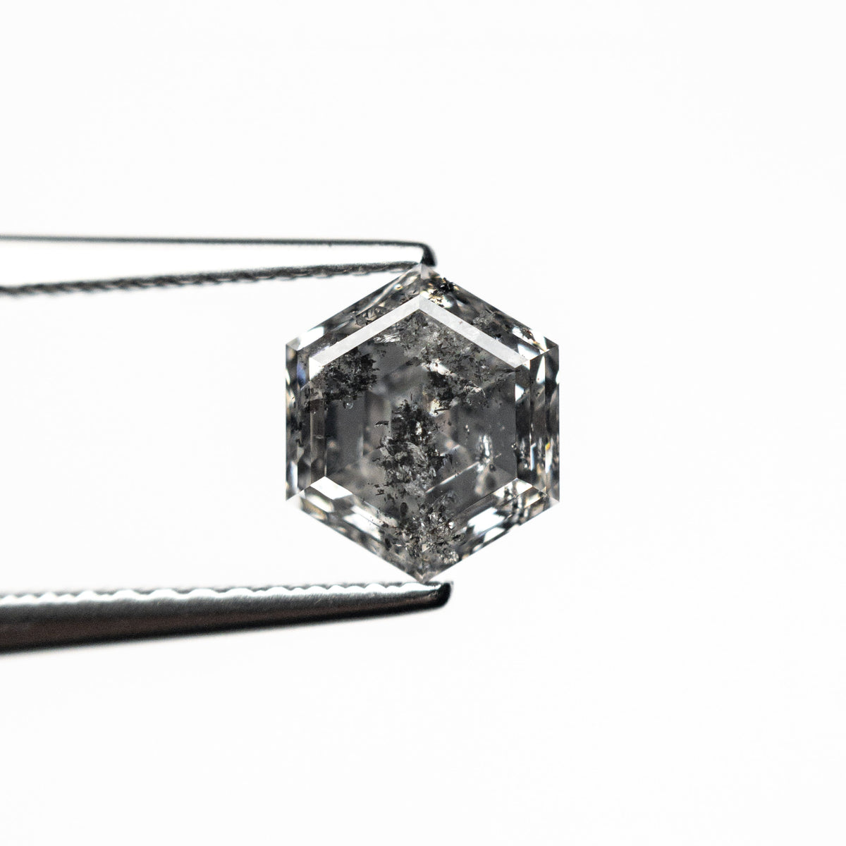 The 1.32ct 7.10x6.09x4.21mm Hexagon Step Cut 🇨🇦 26922-01 by East London jeweller Rachel Boston | Discover our collections of unique and timeless engagement rings, wedding rings, and modern fine jewellery.
