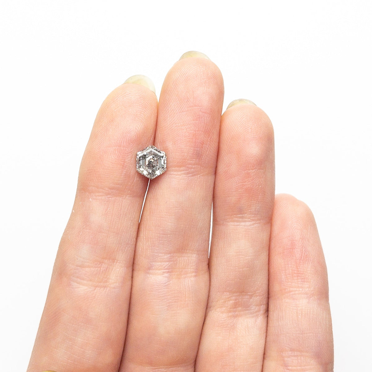 The 1.32ct 7.10x6.09x4.21mm Hexagon Step Cut 🇨🇦 26922-01 by East London jeweller Rachel Boston | Discover our collections of unique and timeless engagement rings, wedding rings, and modern fine jewellery.