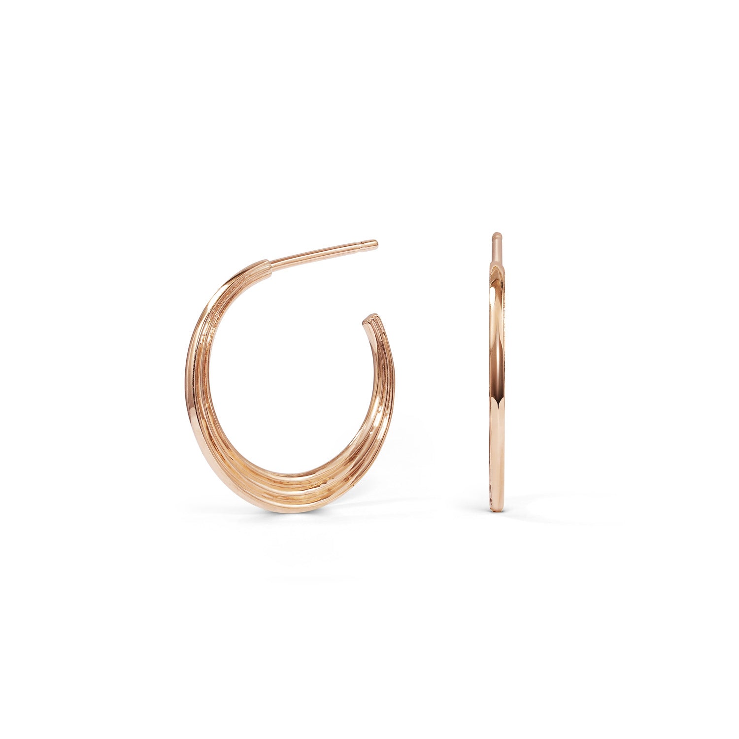 The Adversus Hoop Earrings by East London jeweller Rachel Boston | Discover our collections of unique and timeless engagement rings, wedding rings, and modern fine jewellery.
