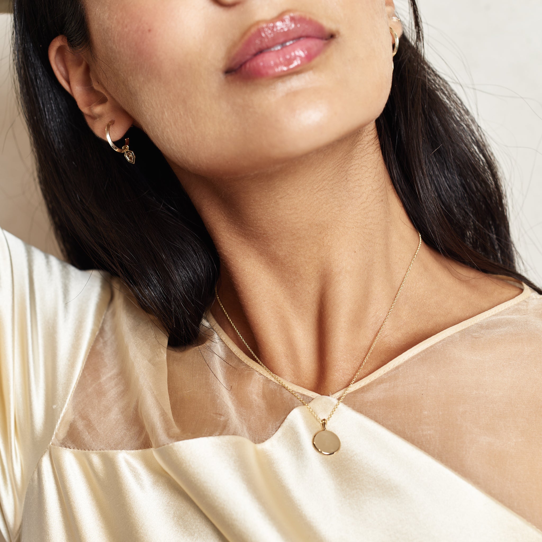 The Chamfered Round ID Necklace by East London jeweller Rachel Boston | Discover our collections of unique and timeless engagement rings, wedding rings, and modern fine jewellery.