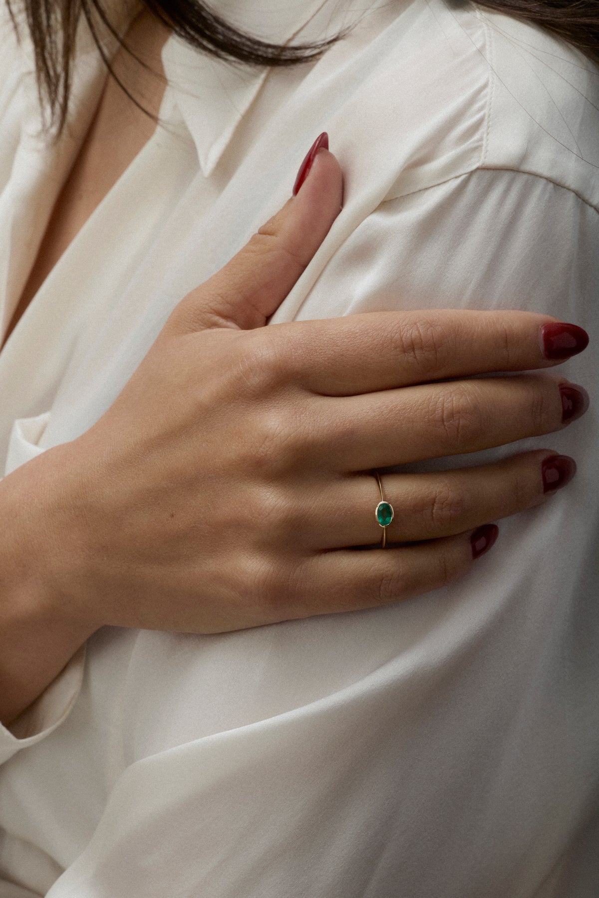 The Emerald Rubover Knife Edge Ring by East London jeweller Rachel Boston | Discover our collections of unique and timeless engagement rings, wedding rings, and modern fine jewellery.