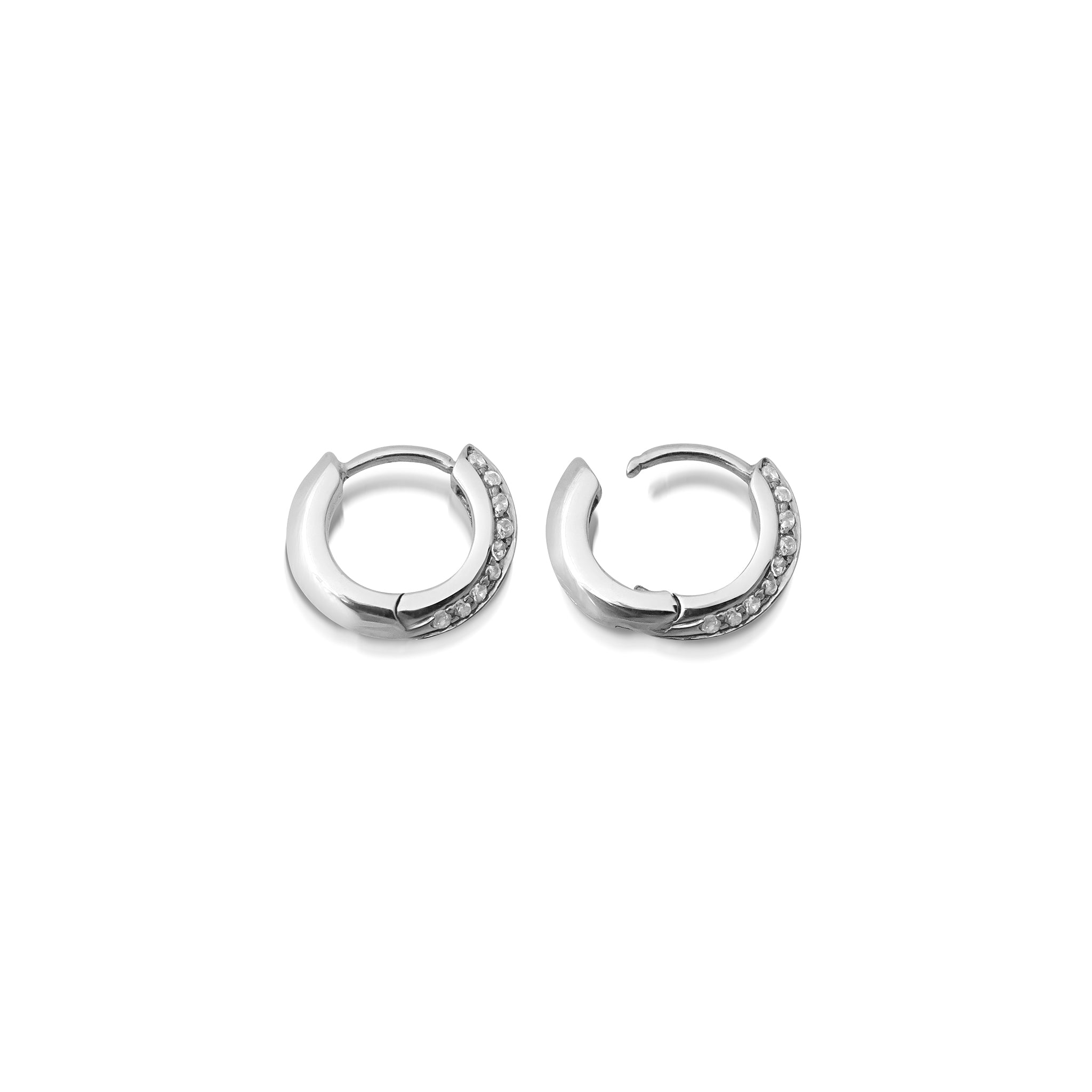The 10mm Knife Edge Diamond Huggie Hoop Earrings by East London jeweller Rachel Boston | Discover our collections of unique and timeless engagement rings, wedding rings, and modern fine jewellery.