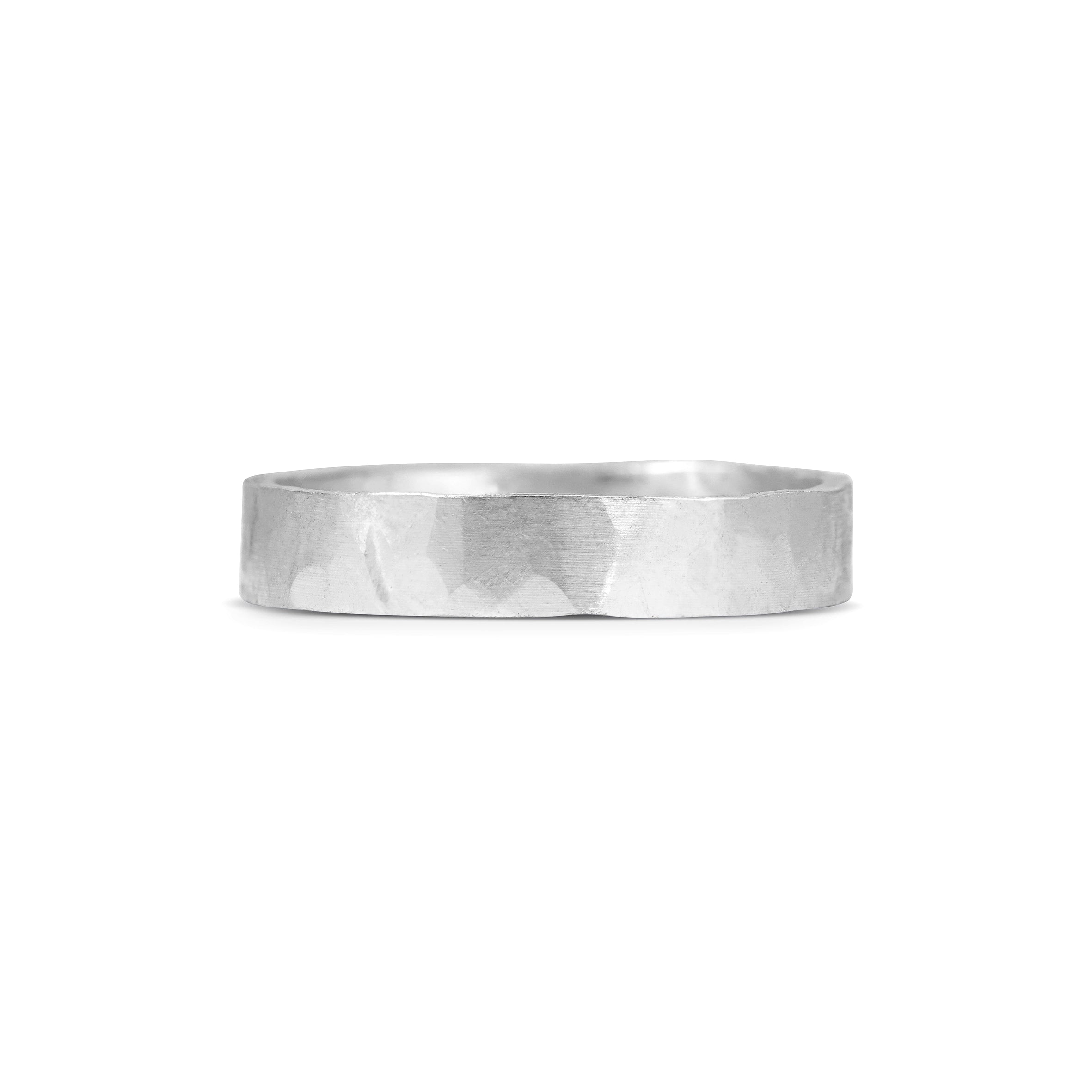 The Matte Hammered Flat Wedding Band - 4.5mm by East London jeweller Rachel Boston | Discover our collections of unique and timeless engagement rings, wedding rings, and modern fine jewellery.