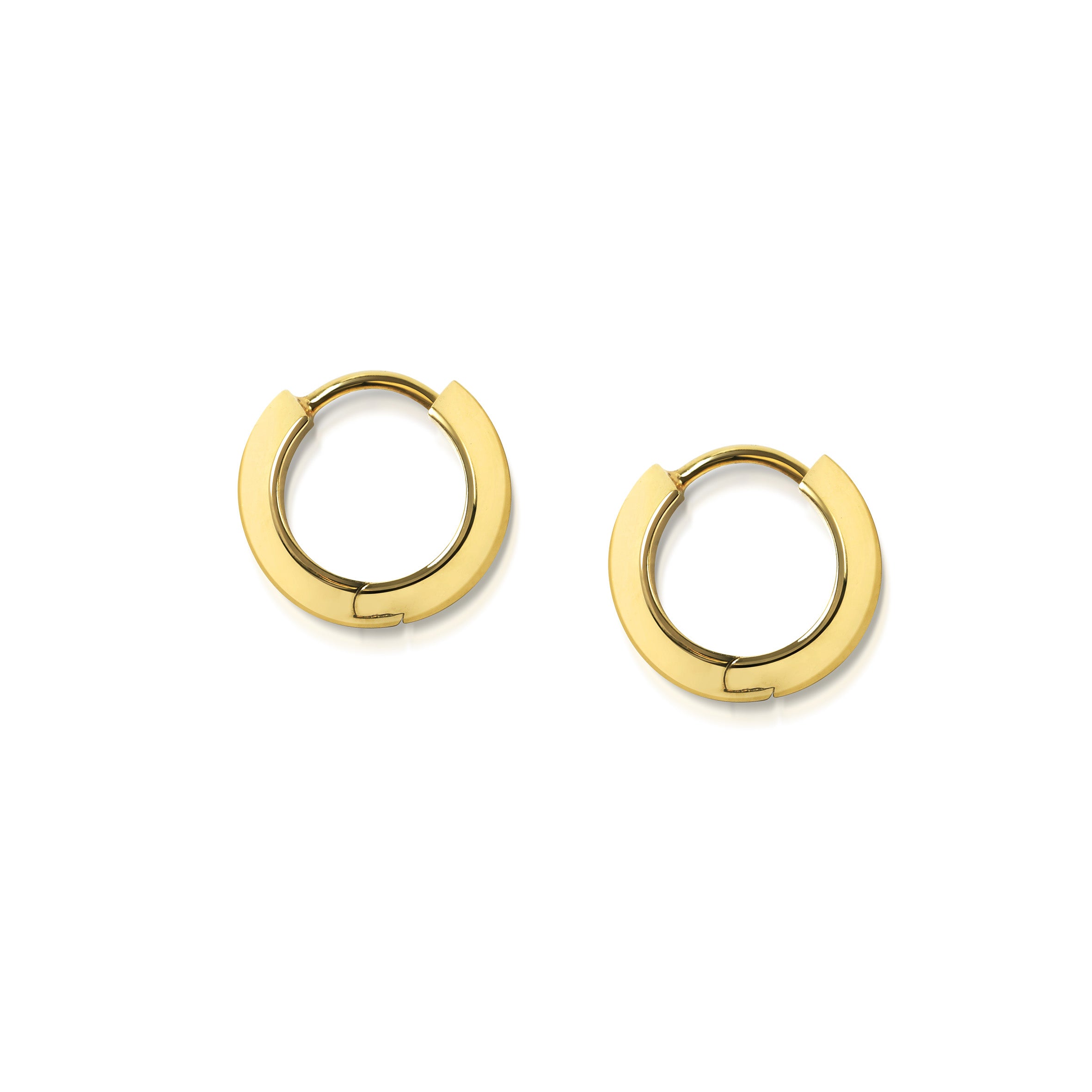 The Chunky Knife Edge Huggie Hoop Earrings by East London jeweller Rachel Boston | Discover our collections of unique and timeless engagement rings, wedding rings, and modern fine jewellery.