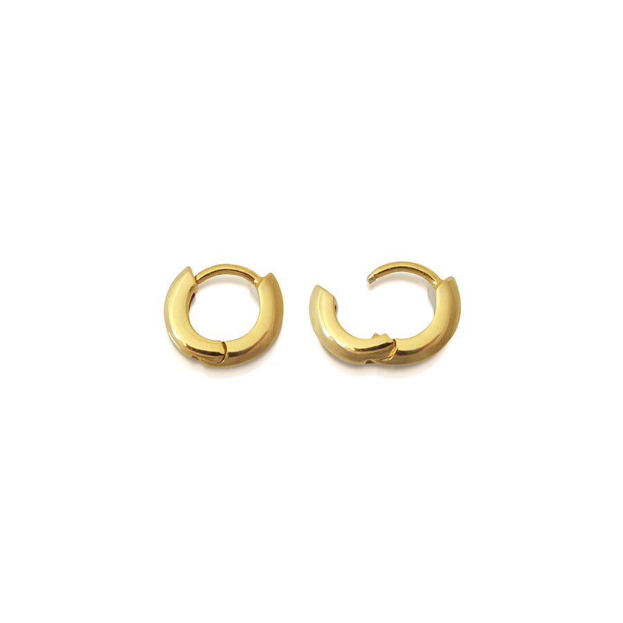 The 6.5mm Knife Edge Huggie Hoop Earrings by East London jeweller Rachel Boston | Discover our collections of unique and timeless engagement rings, wedding rings, and modern fine jewellery. - Rachel Boston Jewellery