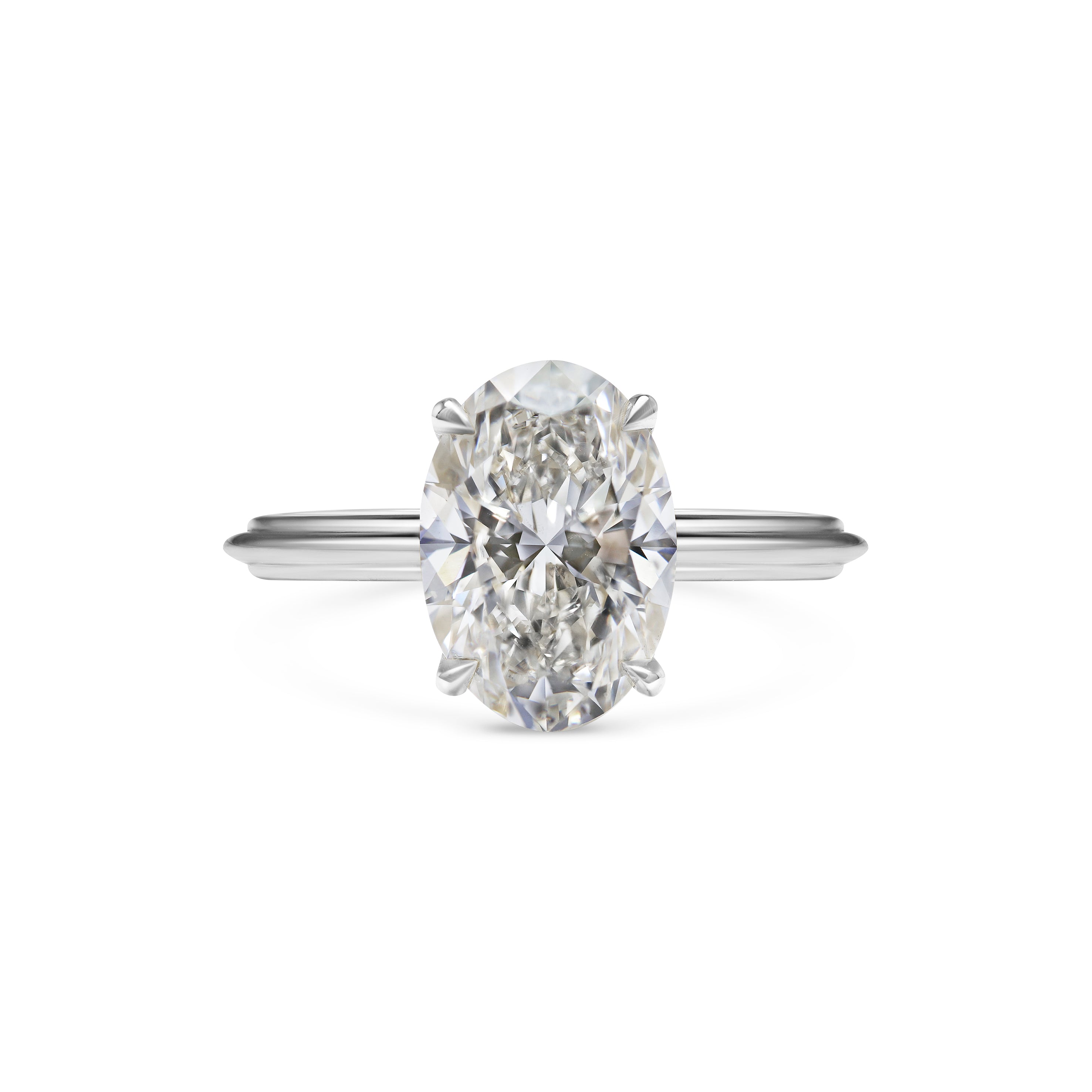 The Blanche Ring - Oval Cut by East London jeweller Rachel Boston | Discover our collections of unique and timeless engagement rings, wedding rings, and modern fine jewellery.