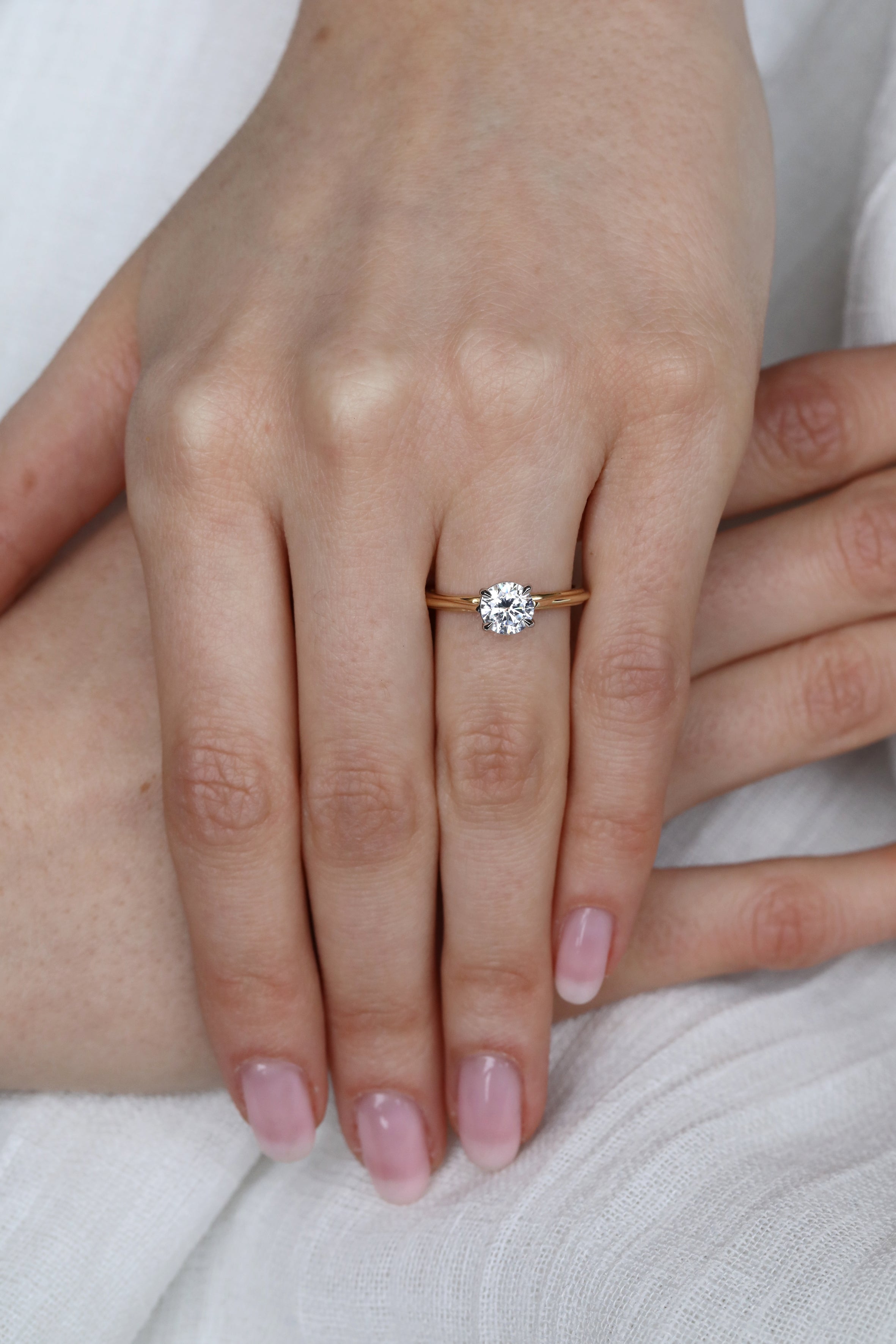The Blanche Ring - Round Cut by East London jeweller Rachel Boston | Discover our collections of unique and timeless engagement rings, wedding rings, and modern fine jewellery.