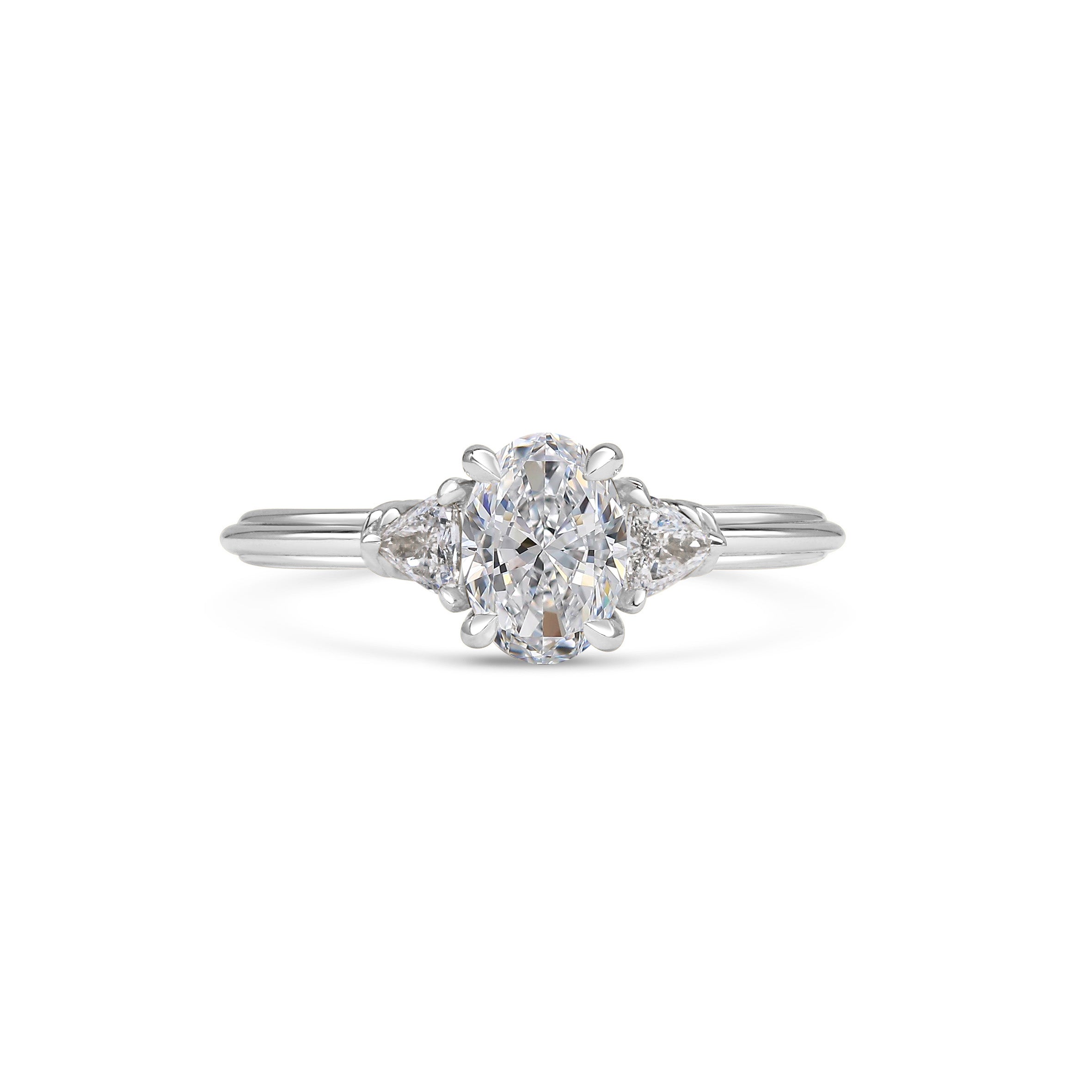The Clara Ring - Oval Cut by East London jeweller Rachel Boston | Discover our collections of unique and timeless engagement rings, wedding rings, and modern fine jewellery.