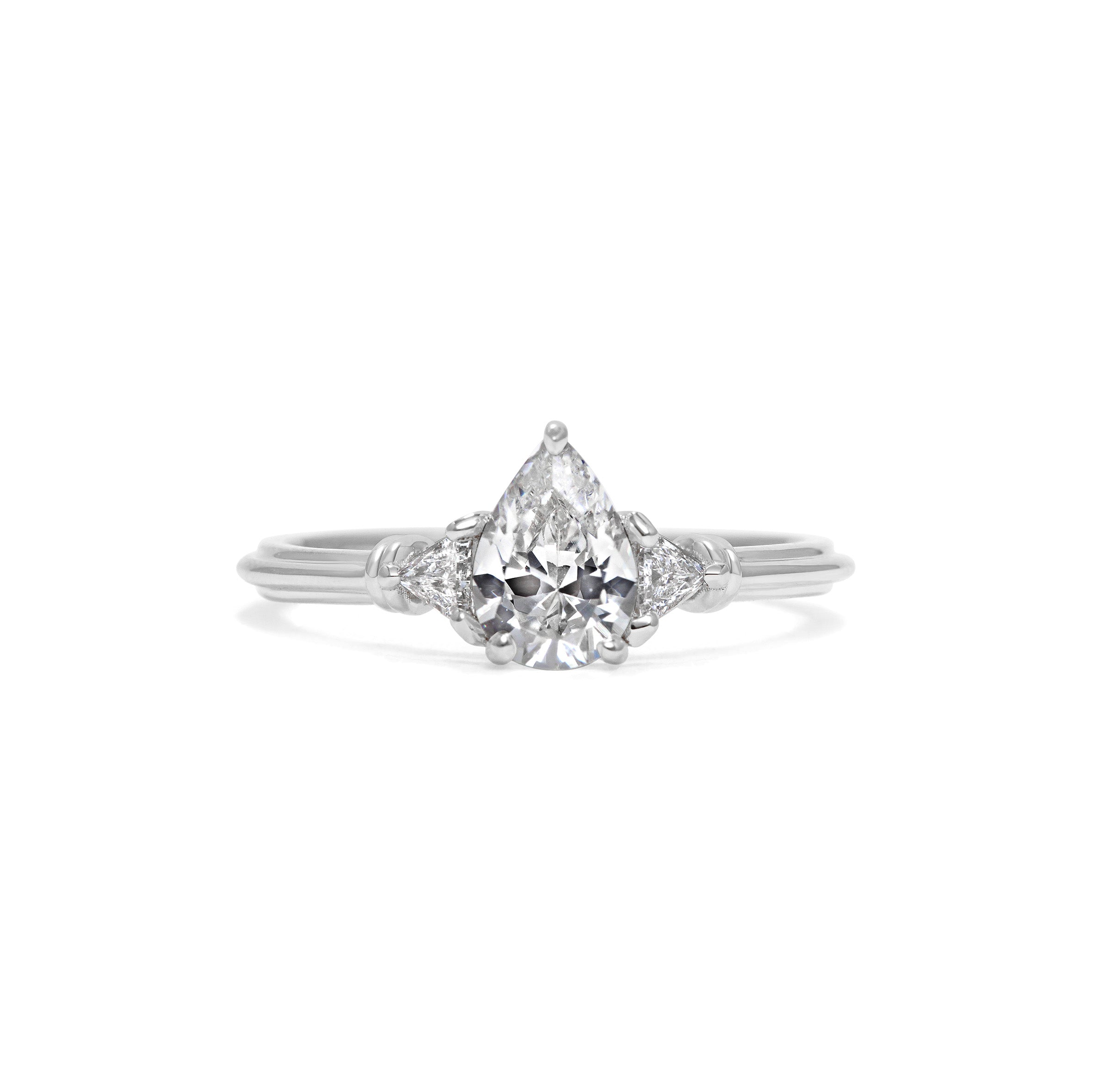 The Clara Ring - Pear Cut by East London jeweller Rachel Boston | Discover our collections of unique and timeless engagement rings, wedding rings, and modern fine jewellery.