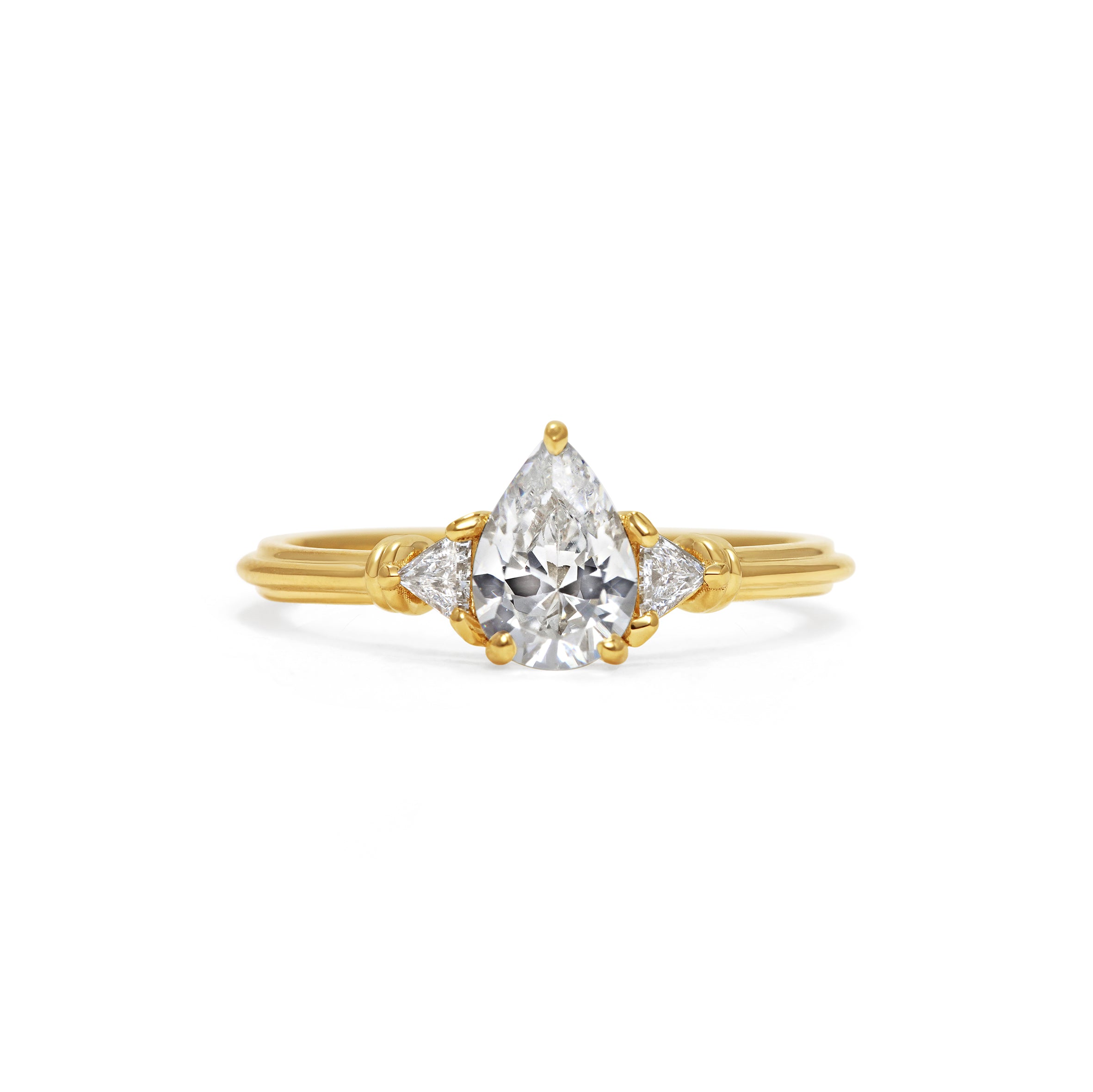 The Clara Ring - Pear Cut by East London jeweller Rachel Boston | Discover our collections of unique and timeless engagement rings, wedding rings, and modern fine jewellery.